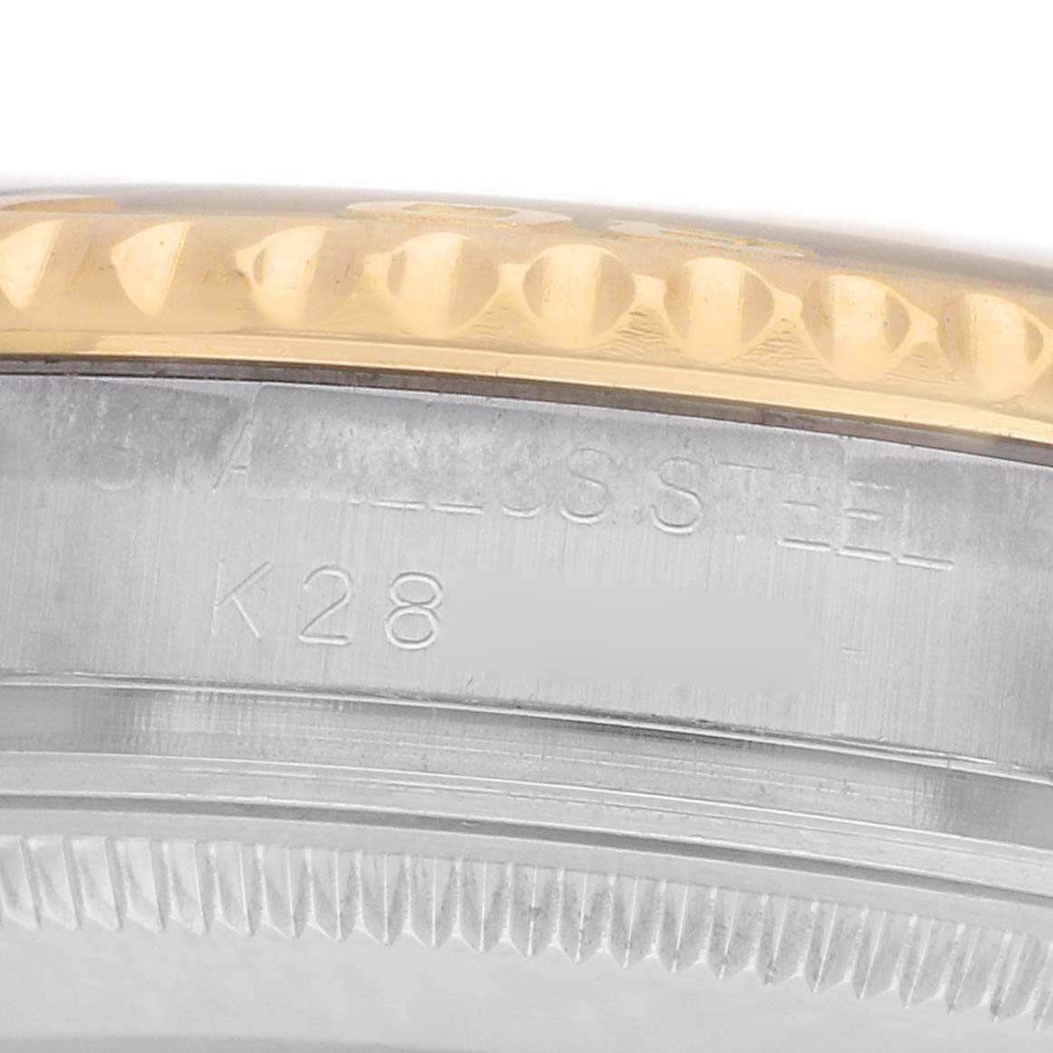 The image shows a close-up of the side of a Rolex Yacht-Master 168623 Men's Steel and Gold (two tone) Blue Dial, highlighting its stainless steel case and gold bezel.