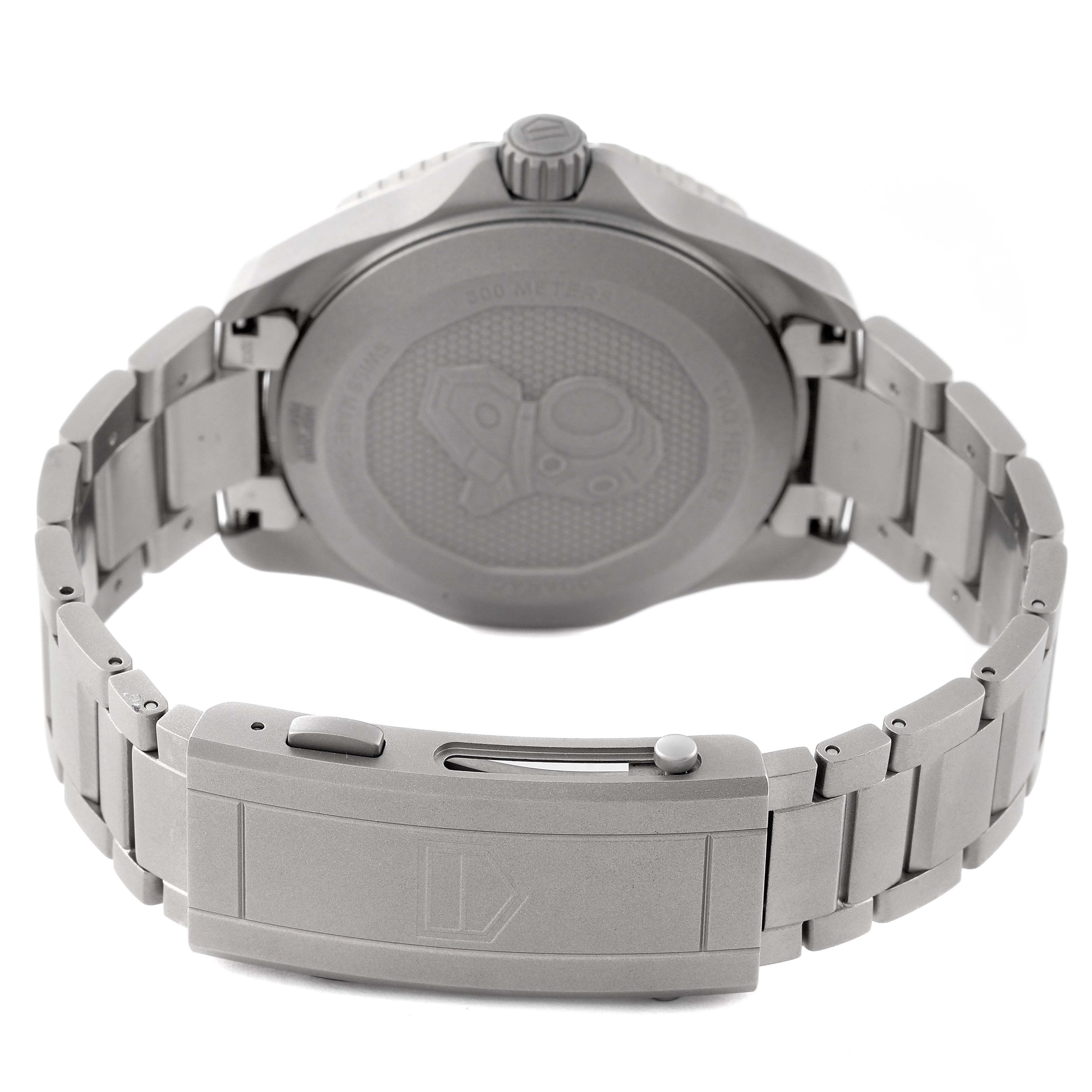 The image shows the back case and bracelet clasp of a Tag Heuer Aquaracer WBP208B.BF0631 Men's Titanium Green Dial WBP208B.BF0631 Men's Titanium Green Dial watch, captured from the rear angle.