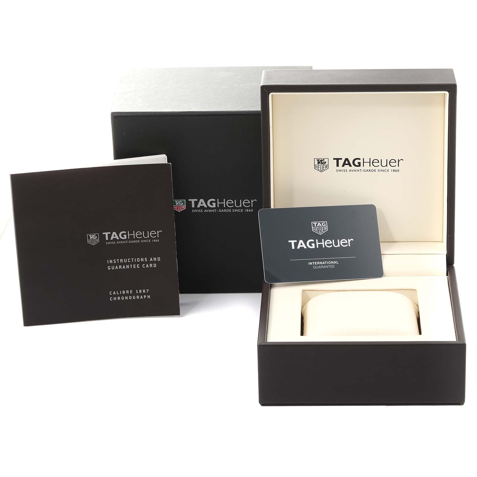 The image shows the packaging, instruction manual, guarantee card, and box for a Tag Heuer Carrera CAR2A83.FT6033 Men's Titanium Black Dial CAR2A83.FT6033 Men's Titanium Black Dial watch.