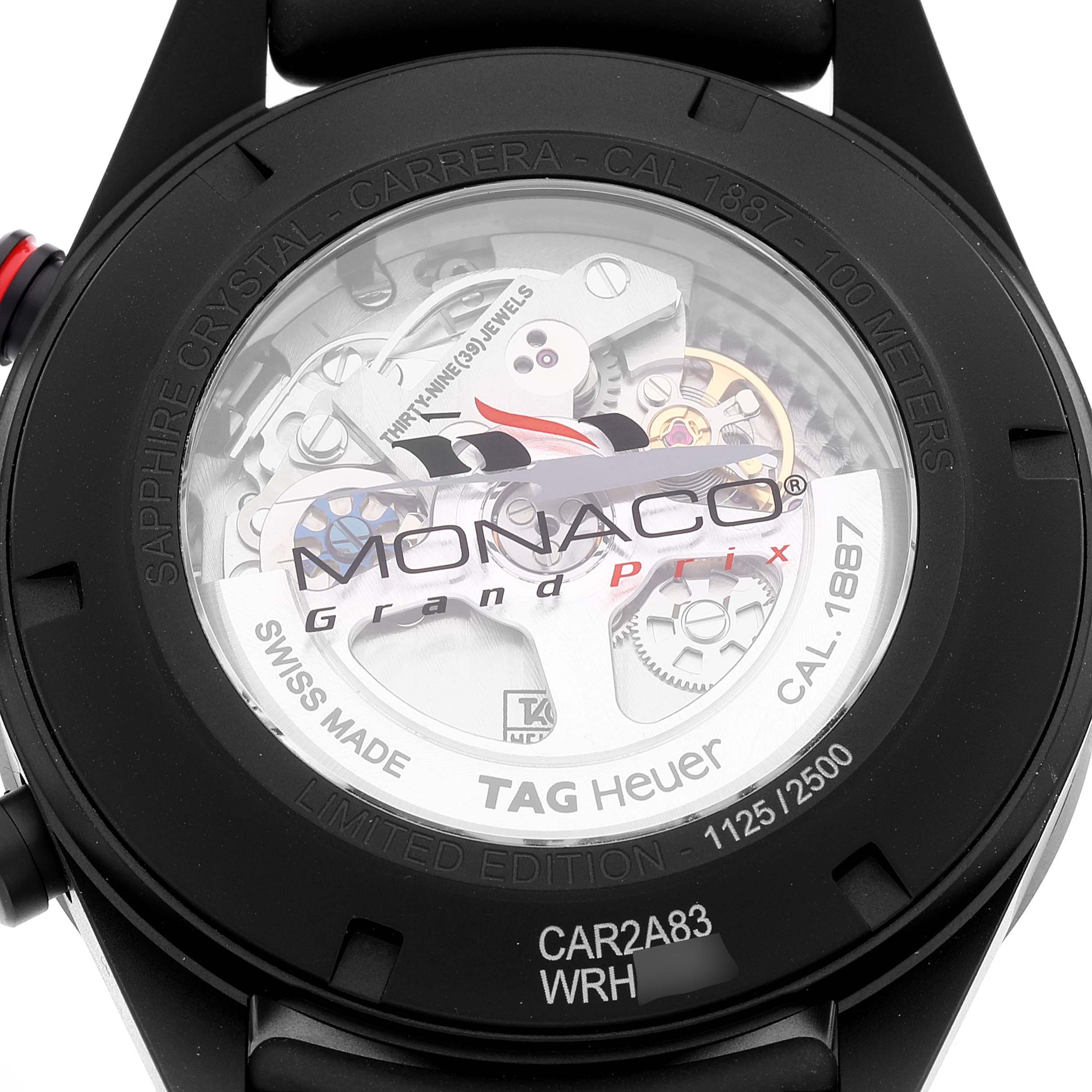 This is the back view of the Tag Heuer Carrera CAR2A83.FT6033 Men's Titanium Black Dial CAR2A83.FT6033 Men's Titanium Black Dial watch, showcasing the internal mechanical movements and inscriptions on the case.