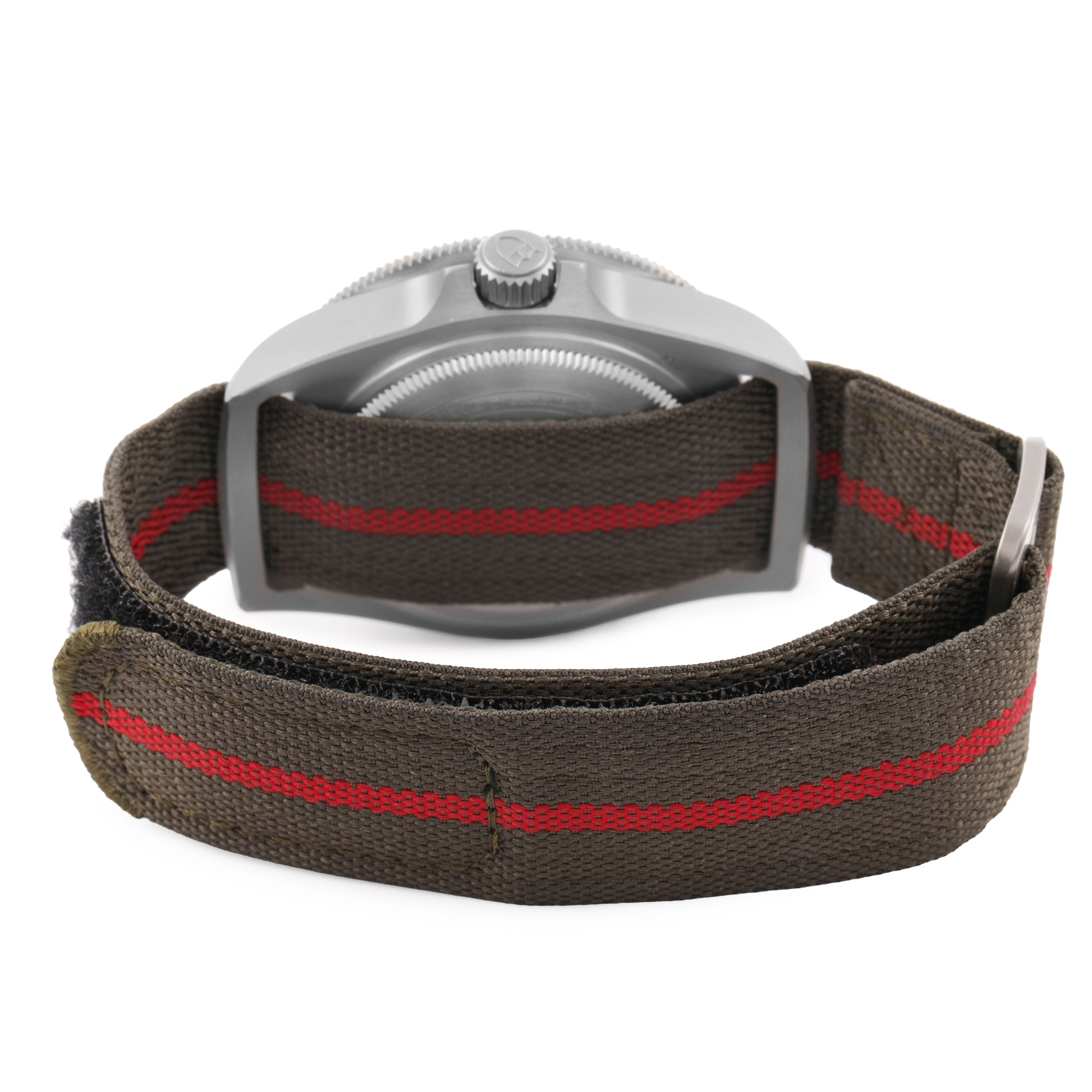 The Tudor Pelagos 25717 Men's Titanium Black Dial watch is shown from the side, highlighting the crown and the fabric strap with a red stripe.