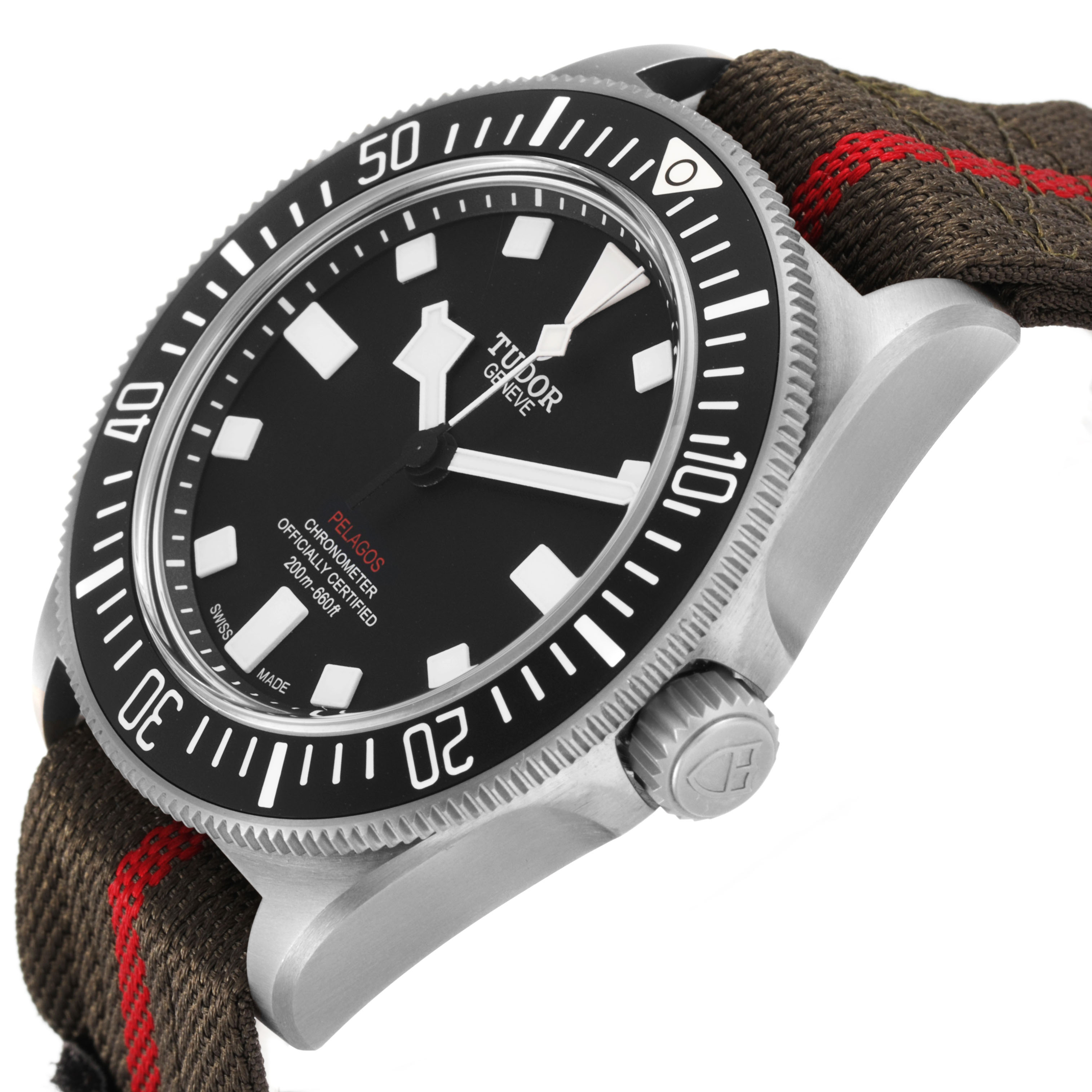 The Tudor Pelagos 25717 Men's Titanium Black Dial watch is shown at an angle highlighting the dial, bezel, case, crown, and fabric strap.