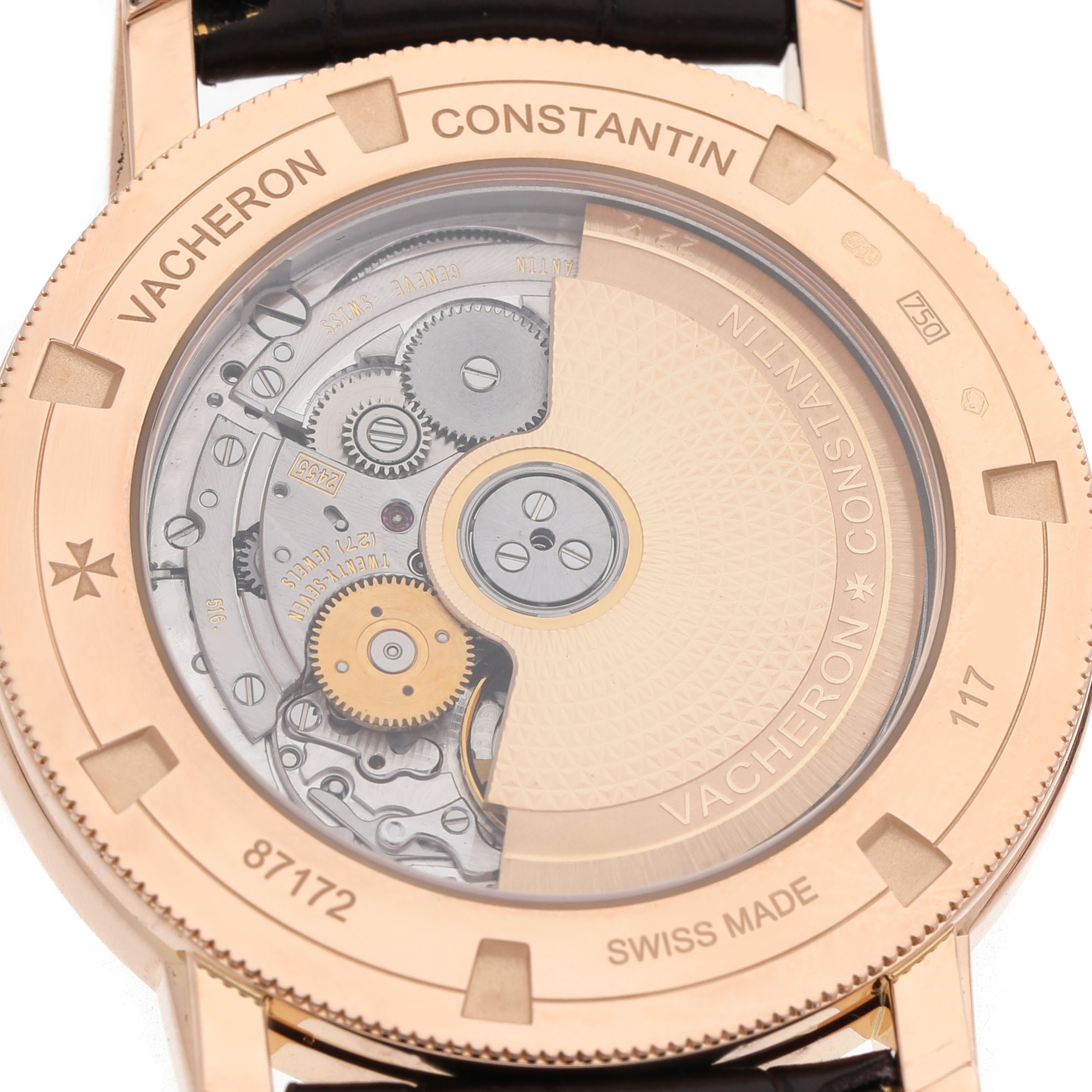 The Vacheron Constantin Traditionnelle 87172/000R-9302 Men's Rose Gold Silver Dial watch is shown from the back, displaying its intricate mechanical movement.