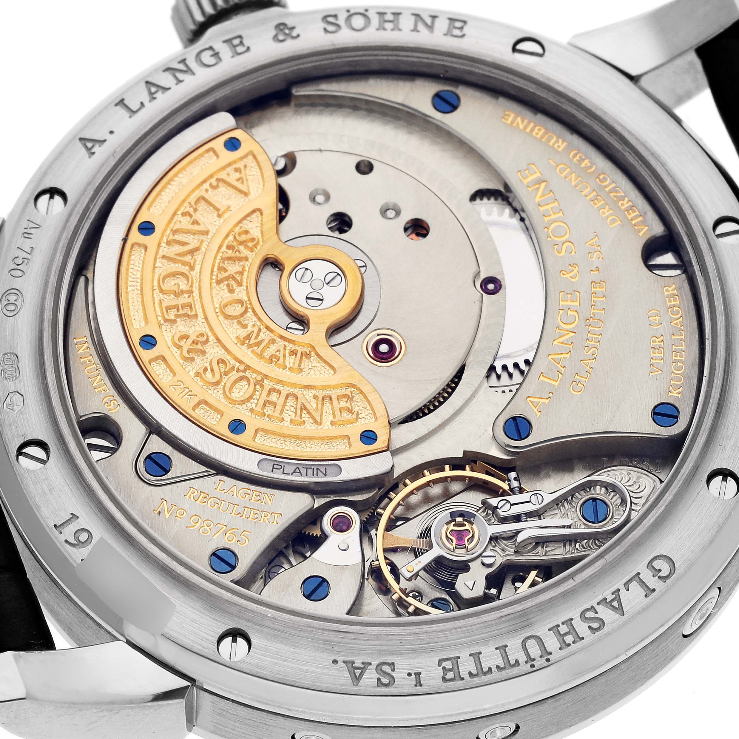 The image shows the back of the A. Lange & Sohne Saxonia 330.026 Men's White Gold Silver Dial, highlighting the intricate movement and engravings.