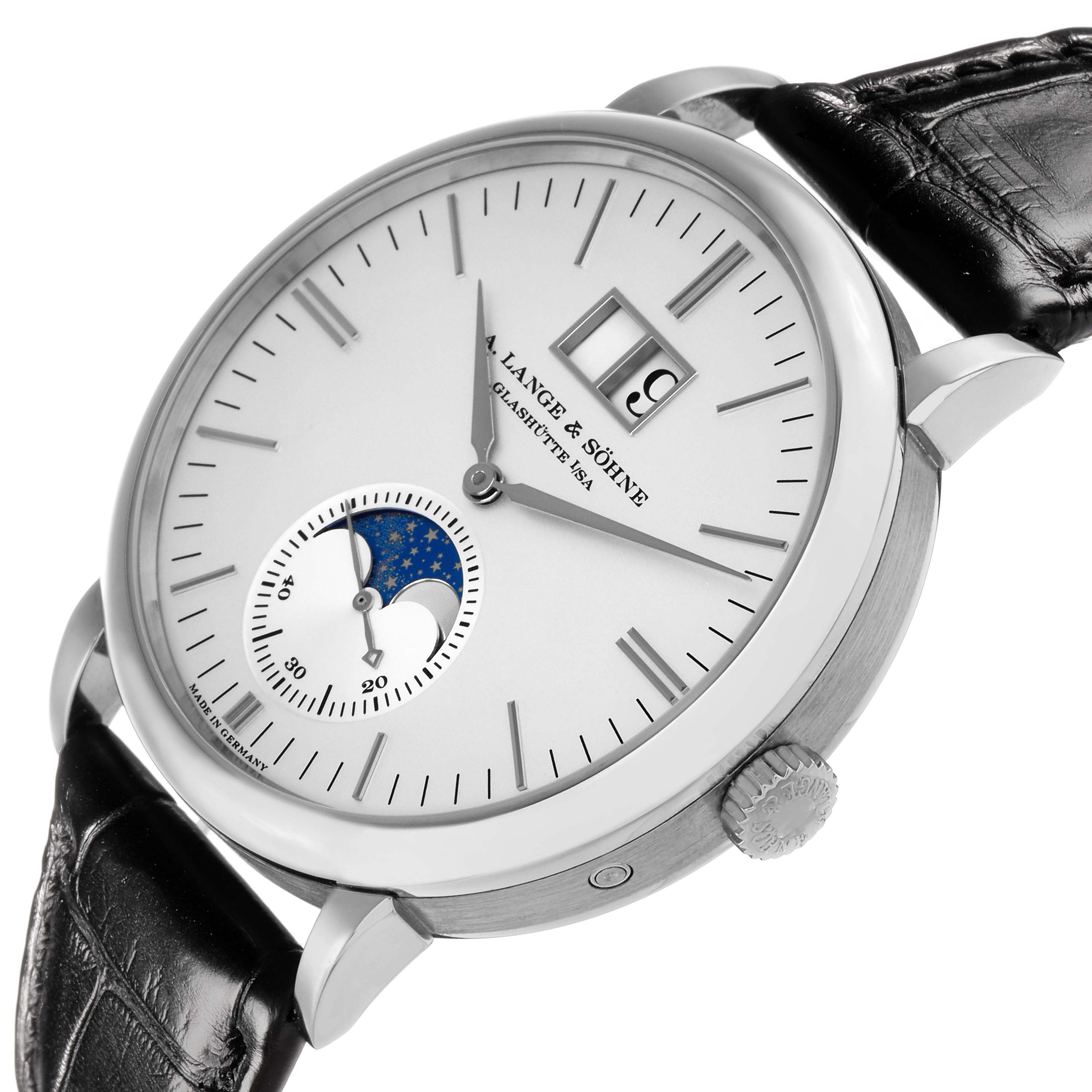The A. Lange 
Sohne Saxonia 384.026 Men
s White Gold Silver Dial watch is shown at an angle displaying the face, moon phase, date, and part of the leather strap.