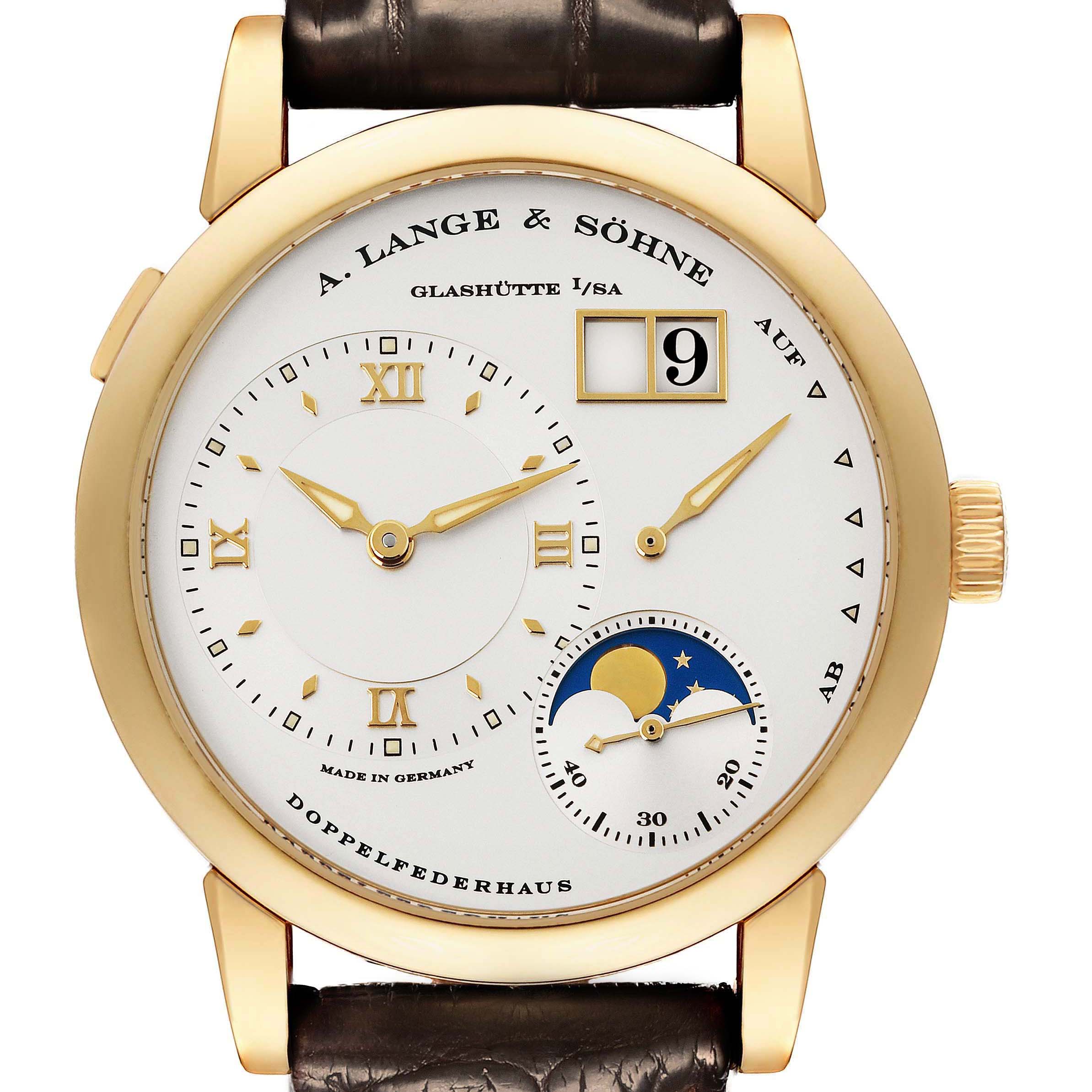 The A. Lange 
Sohne Lange 1 109.021 Men
s Yellow Gold Silver Dial watch is shown from the front, displaying its dial, moon phase, and date features.