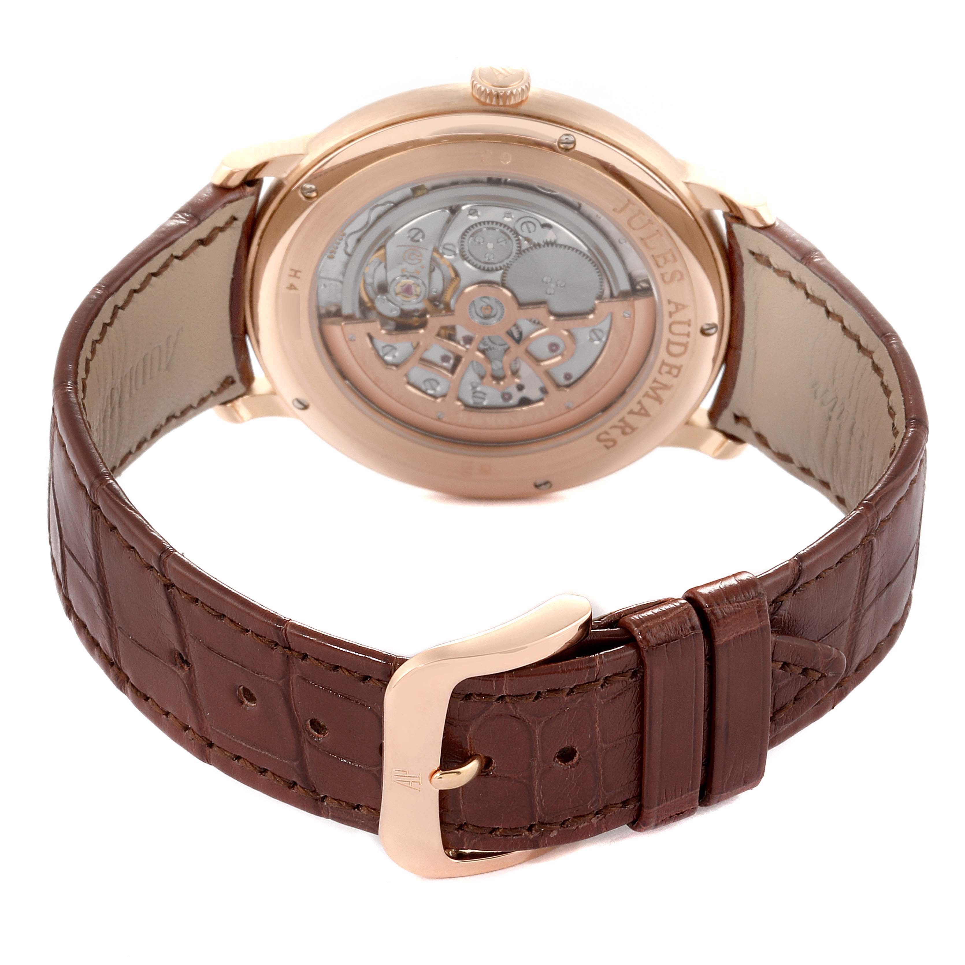 This image shows the back view of a Jules model watch by Audemars Piguet, highlighting the movement and brown leather strap.
