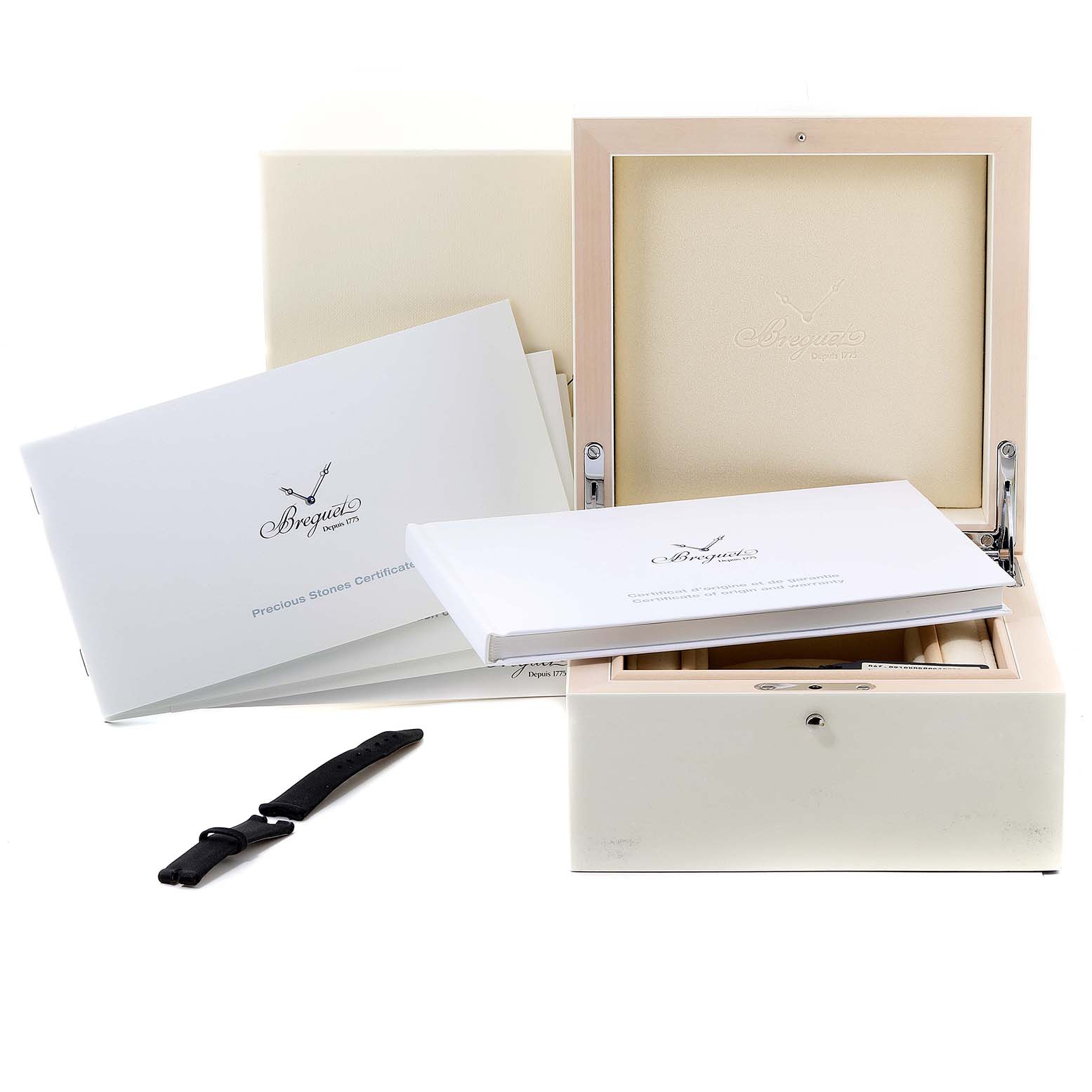 The Breguet Reine de Naples 8918BR/58/964/D00D Women's Rose Gold Mother of Pearl Dial 8918BR/58/964/D00D Women's Rose Gold Mother of Pearl Dial model is shown with its open box, booklets, and a separate black strap.