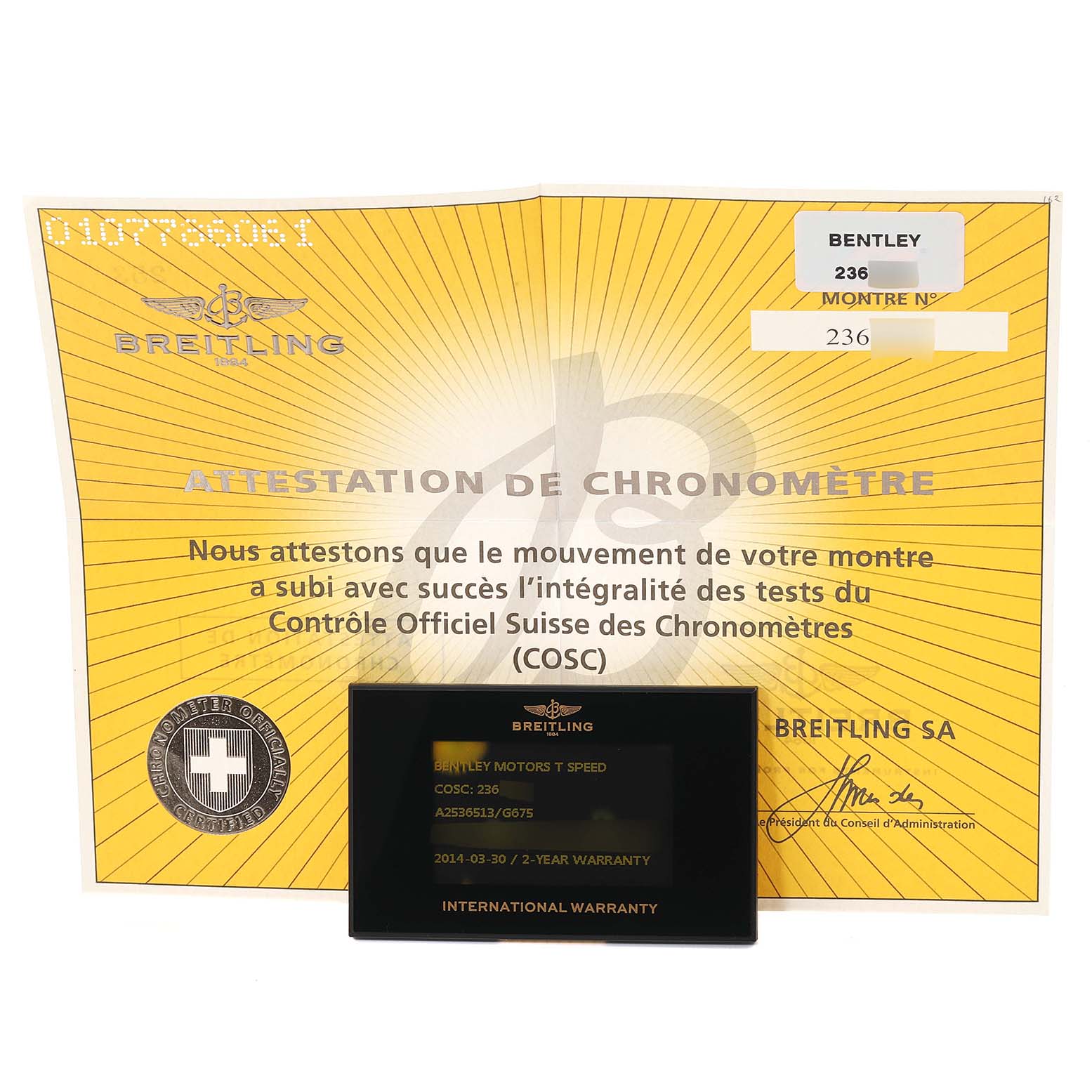 The image shows a yellow Breitling certificate and a black warranty card for the Bentley model watch by Breitling.