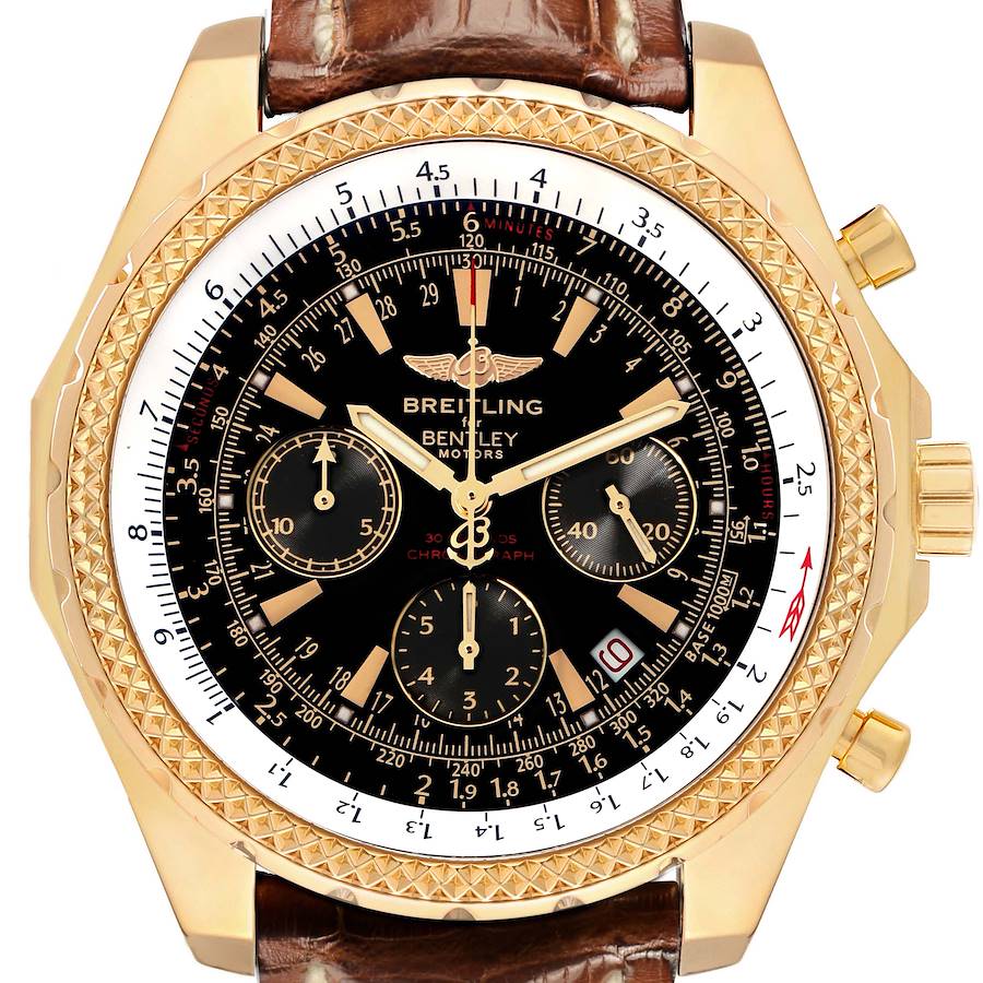 The Breitling Bentley K25362 Men's Yellow Gold Black Dial watch is shown from a top-down angle, highlighting its gold case, brown leather strap, and black dial with subdials.