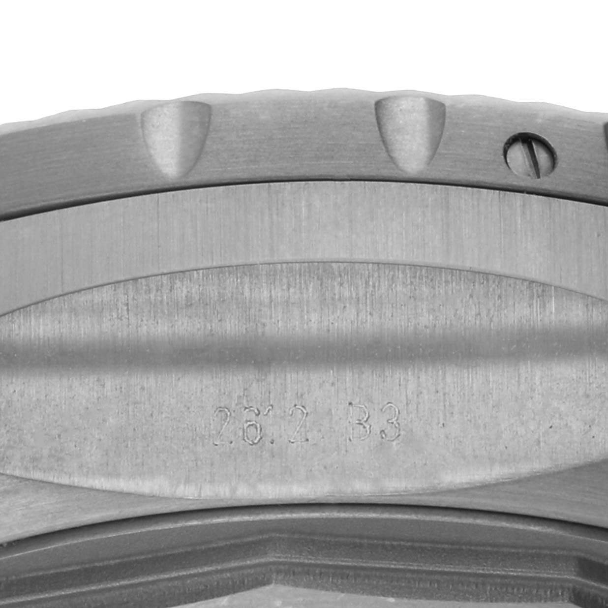 The image shows a close-up view of the bezel and part of the case of a Breitling Bentley E2736522/BC63 Men's Titanium Black Dial E2736522/BC63 Men's Titanium Black Dial model watch.