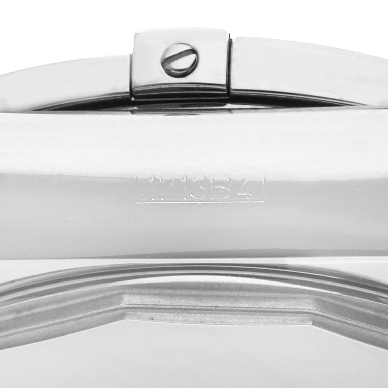 This image shows a close-up of the clasp and part of the band of a Breitling Chronomat AB01103C/BC48 Men's Stainless Steel Mother of Pearl Dial AB01103C/BC48 Men's Stainless Steel Mother of Pearl Dial watch.