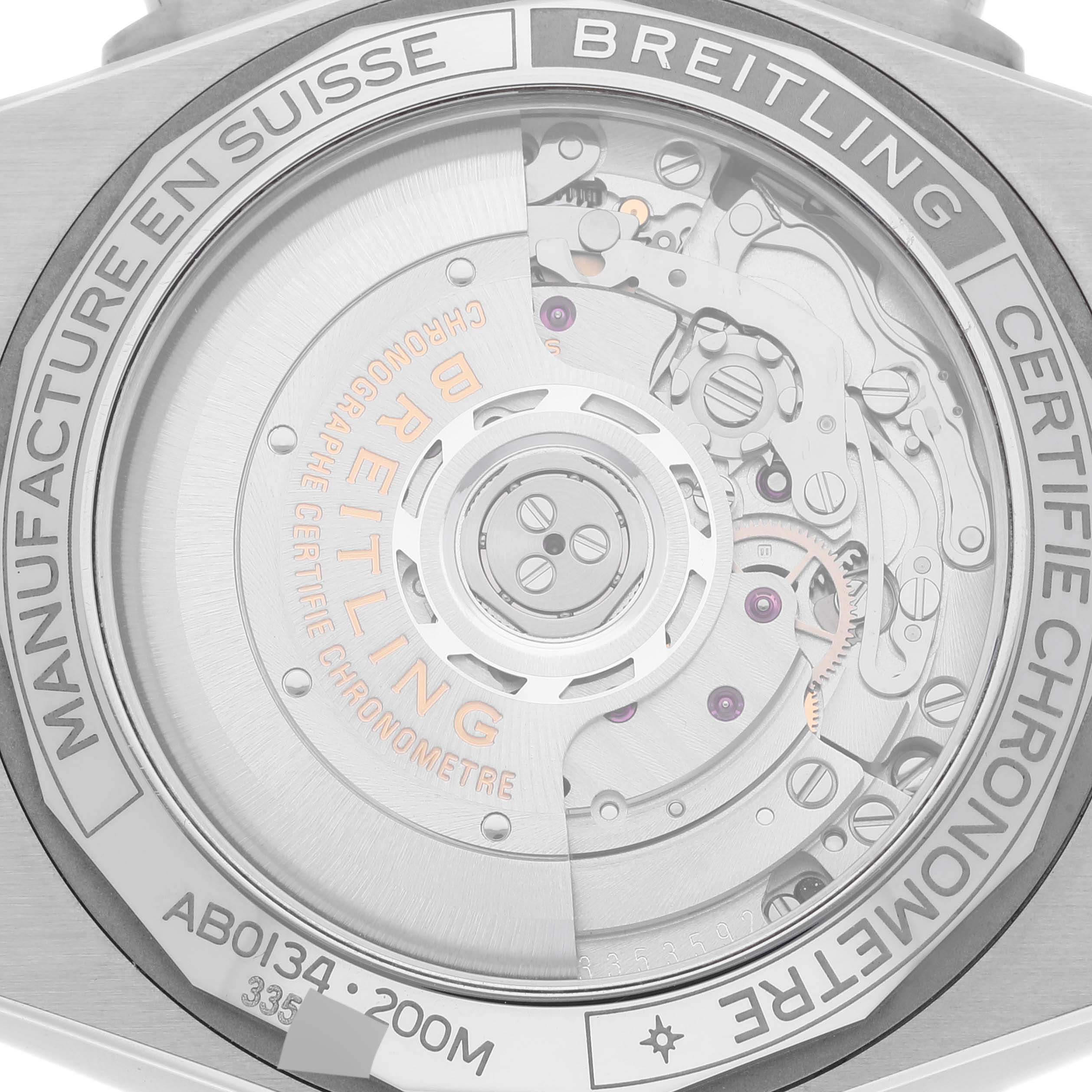 The image shows the backside of a Breitling Chronomat AB0134 Men
s Stainless Steel Silver Dial AB0134 Men
s Stainless Steel Silver Dial watch, highlighting its exposed mechanical movement and certifications.