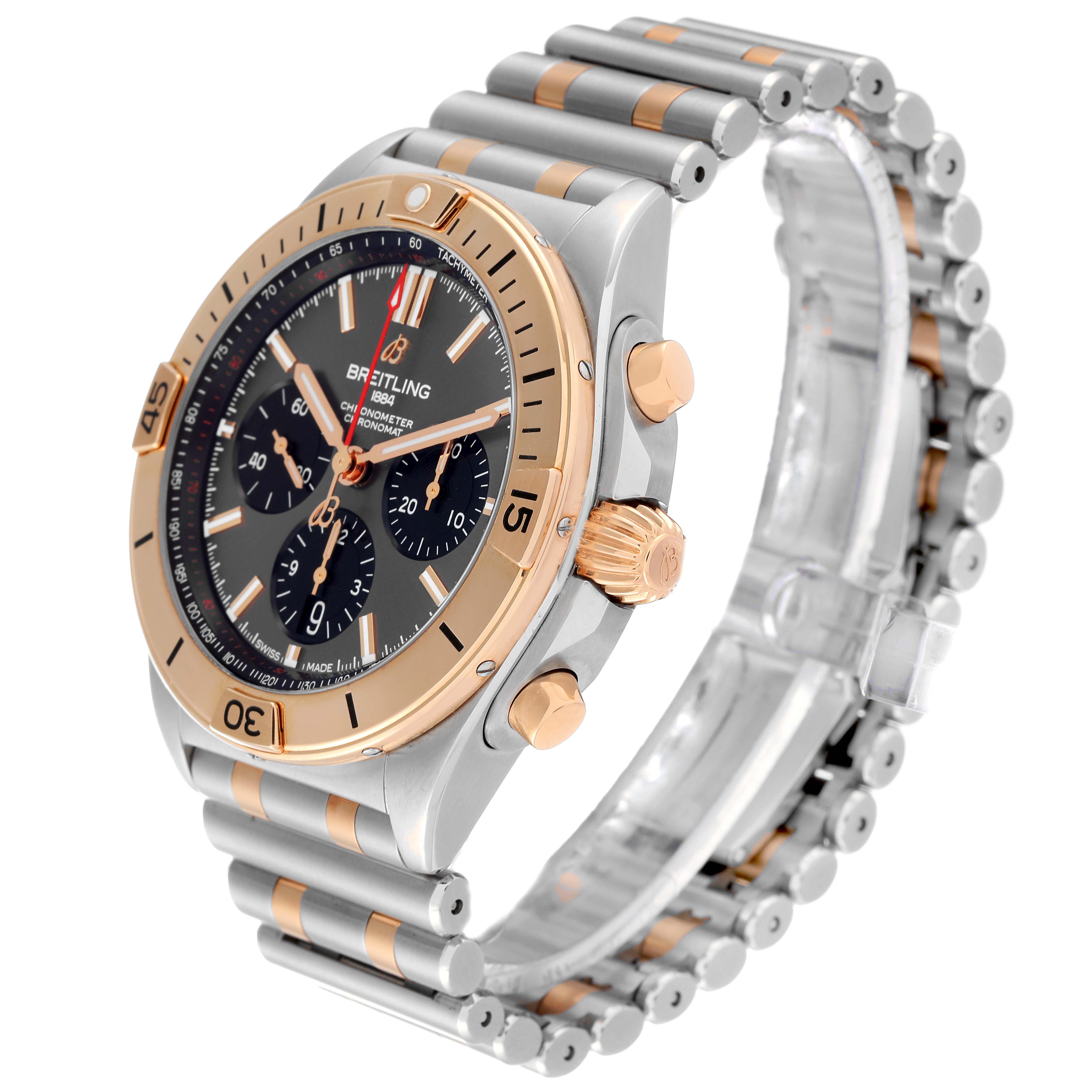 The Breitling Chronomat UB0134 Men's Steel and Gold (two tone) Grey Dial UB0134 Men's Steel and Gold (two tone) Grey Dial watch is shown at a three-quarter angle, highlighting its dial, bezel, and bracelet.