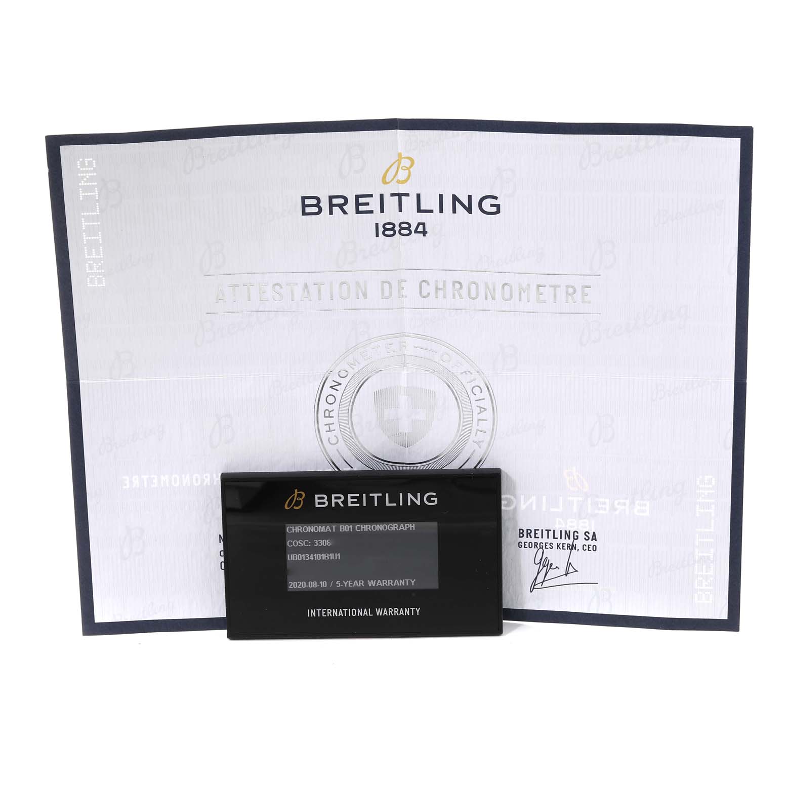 The image shows the warranty card and certificate of the Breitling Chronomat UB0134 Men's Steel and Gold (two tone) Grey Dial UB0134 Men's Steel and Gold (two tone) Grey Dial watch.