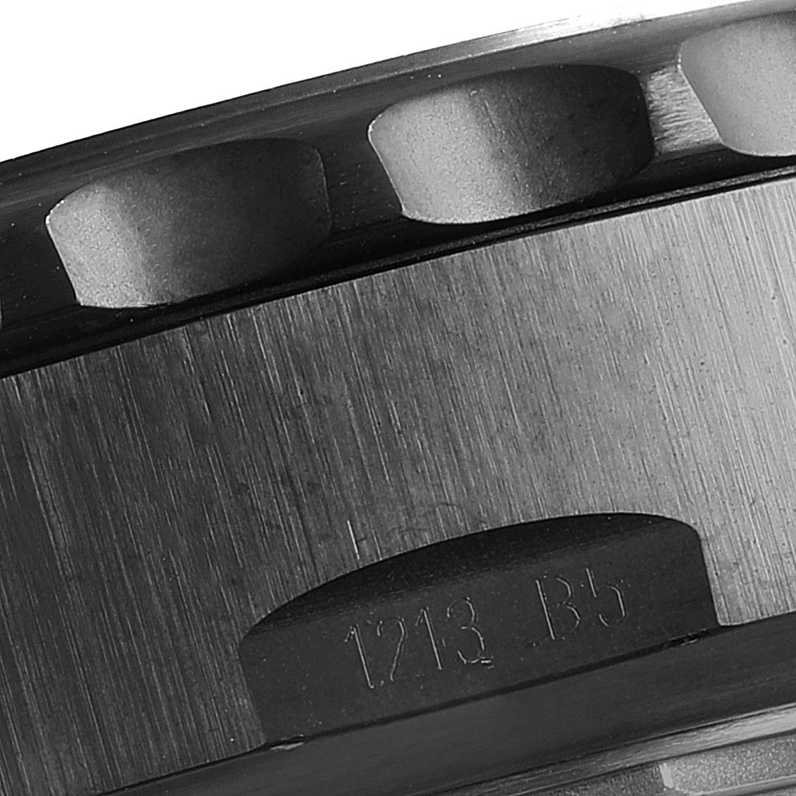 This close-up of the Breitling Limited Series watch shows a detailed view of its case with marking "1213 B5".