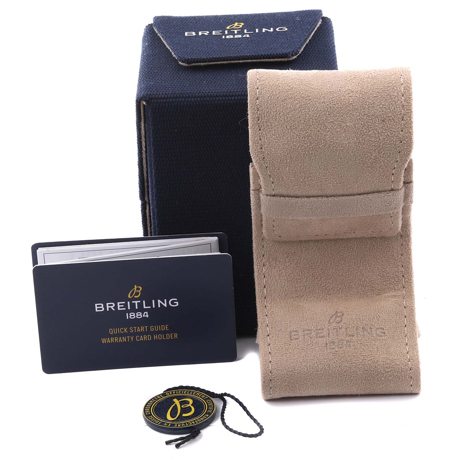 The image shows accessories for the Breitling Navitimer AB0137 Men
s Stainless Steel Blue Dial AB0137 Men
s Stainless Steel Blue Dial, including a pouch, box, guide, warranty card, and a tag.