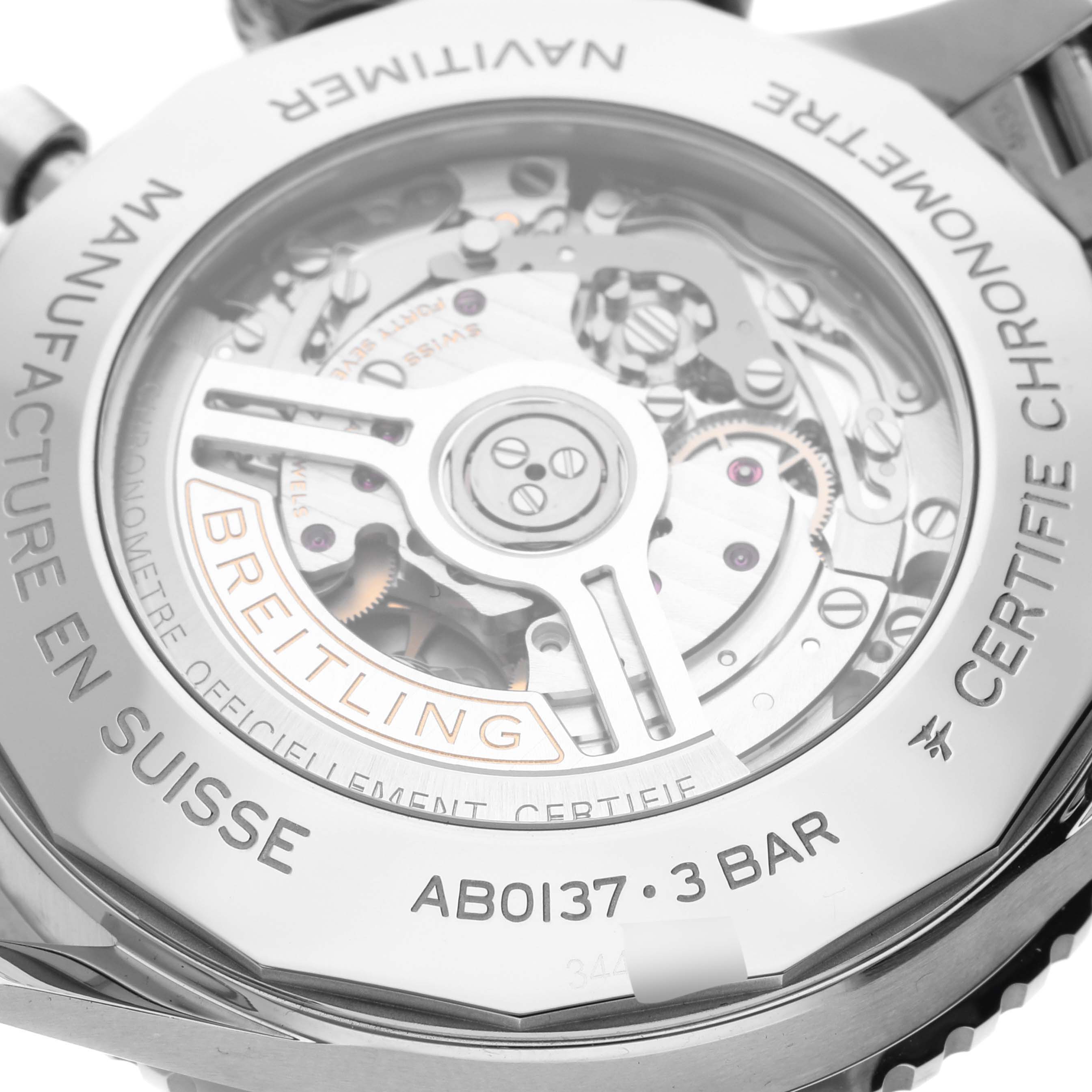 The image shows the back of the Breitling Navitimer AB0137 Men
s Stainless Steel Blue Dial AB0137 Men
s Stainless Steel Blue Dial, displaying its mechanical movement through a transparent case back.