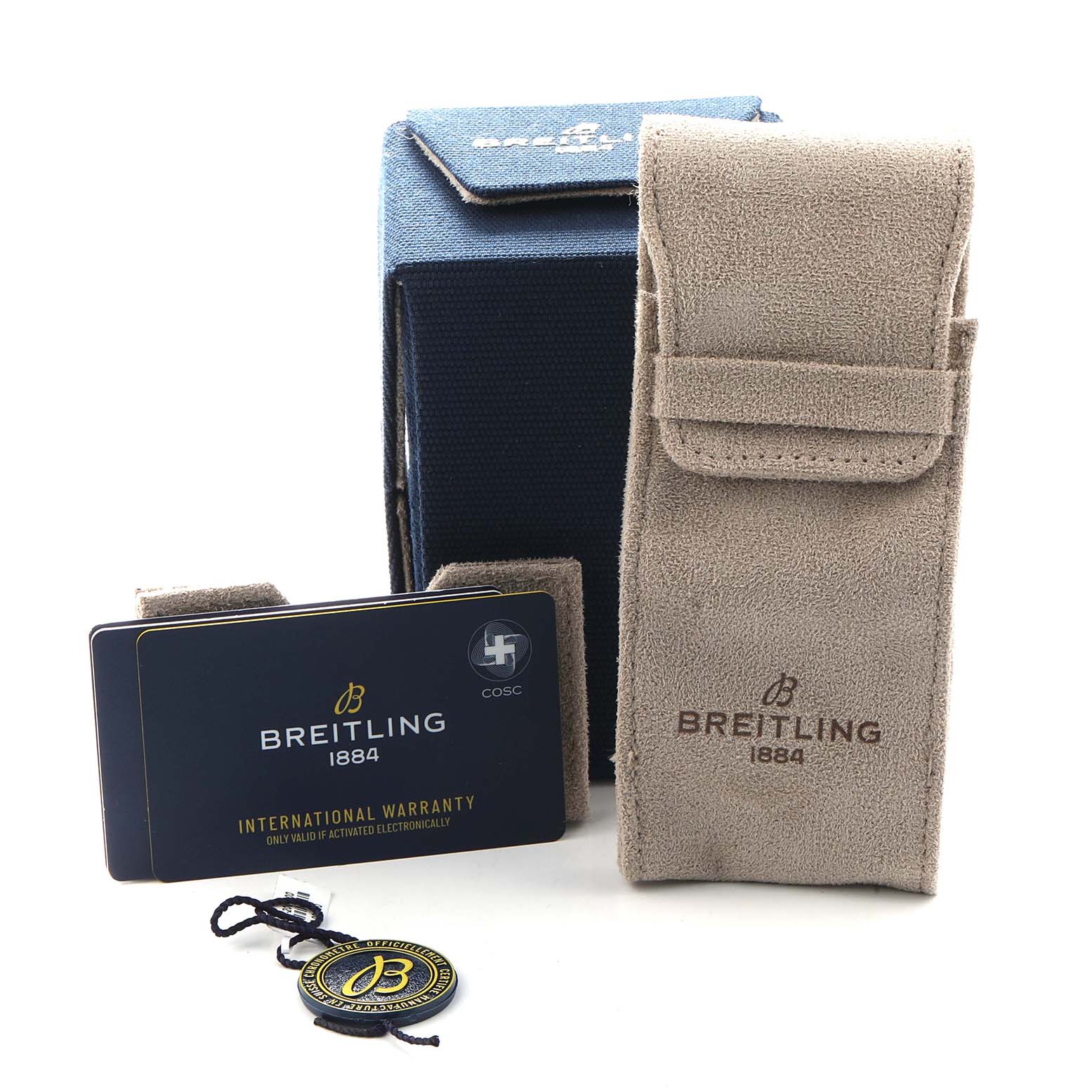 The image shows accessories for a Breitling Premier AB0930 Men
s Stainless Steel Green Dial watch, including a soft pouch, warranty card, box, and tag.
