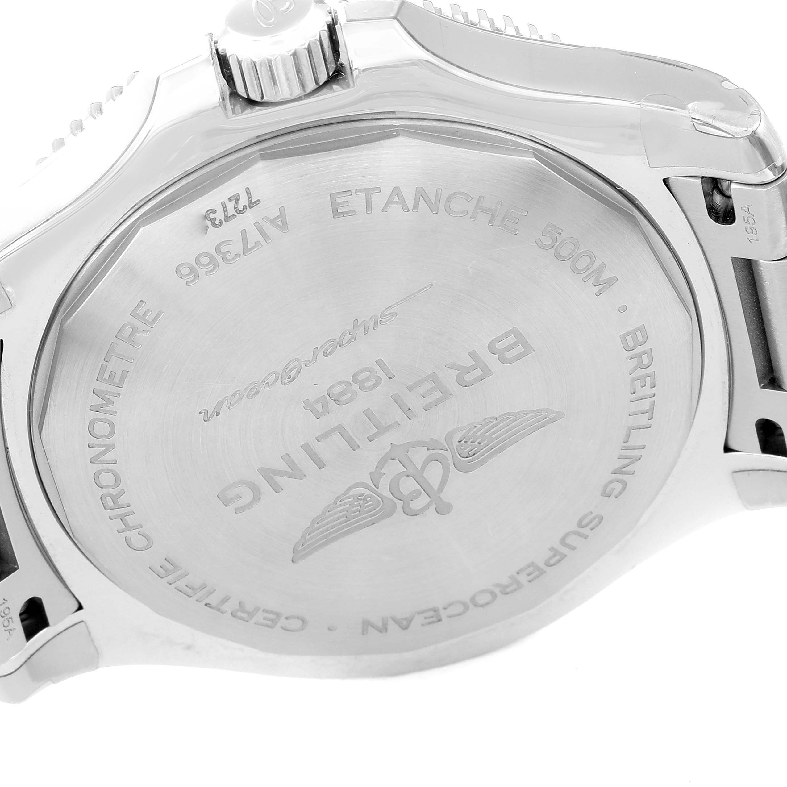 The image shows the back case of a Breitling Superocean A17366 Men's Stainless Steel Blue Dial A17366 Men's Stainless Steel Blue Dial watch, viewed at an angle that displays the engraved details.