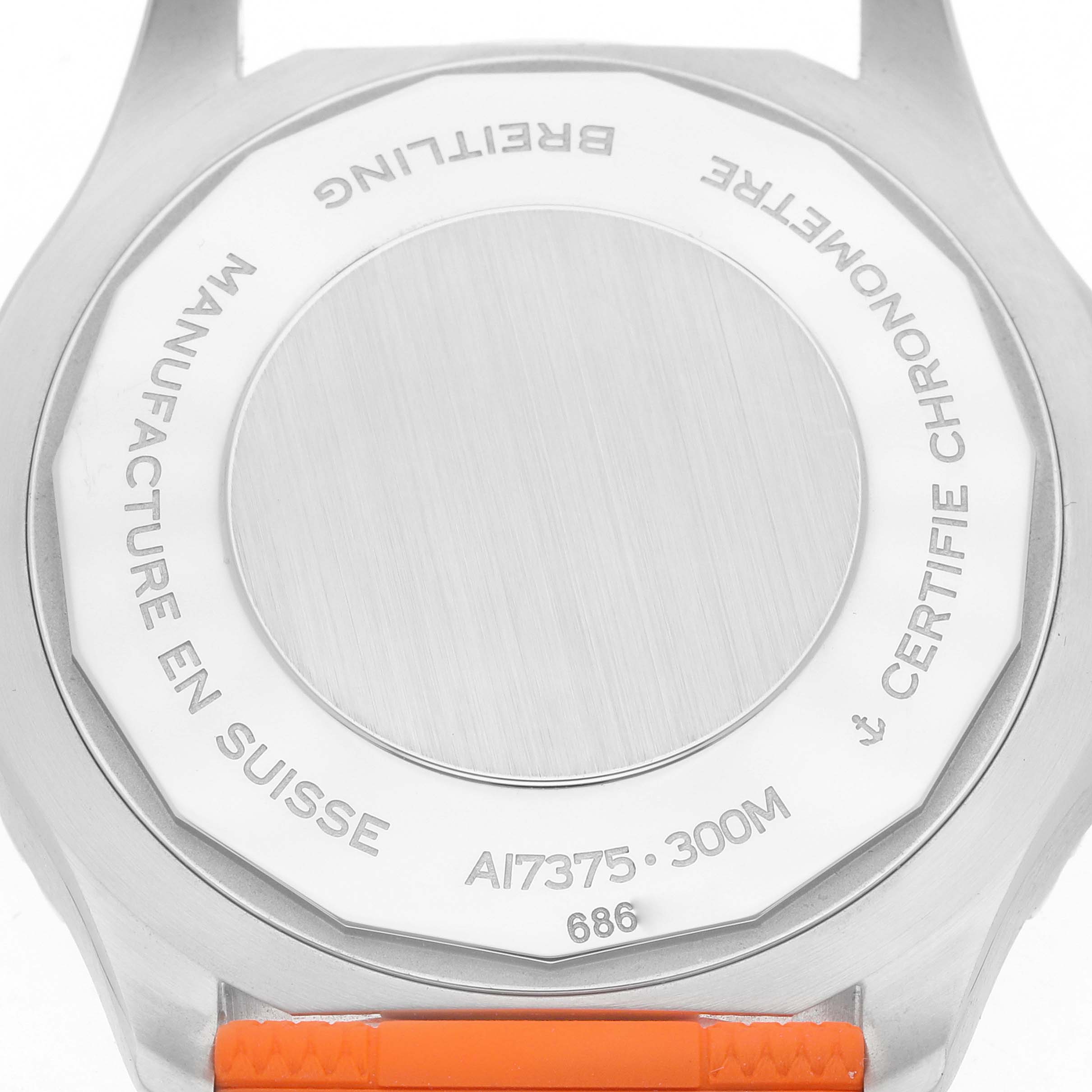 The image shows the back of a Breitling Superocean A17375 Men
s Stainless Steel Black Dial watch, highlighting the case back with engravings.