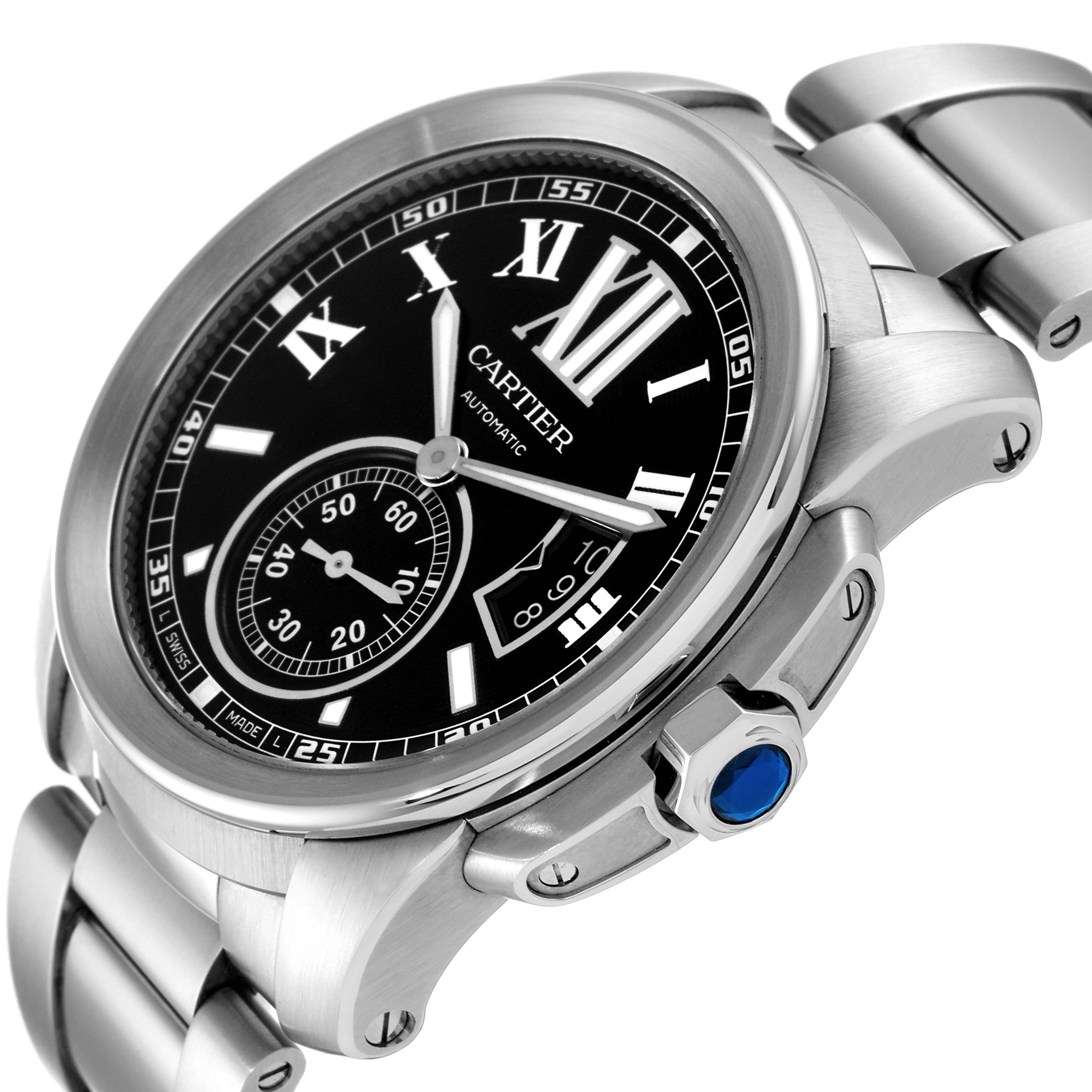 The image shows a close-up angle of the Calibre de Cartier watch by Cartier, highlighting its face and metal band.