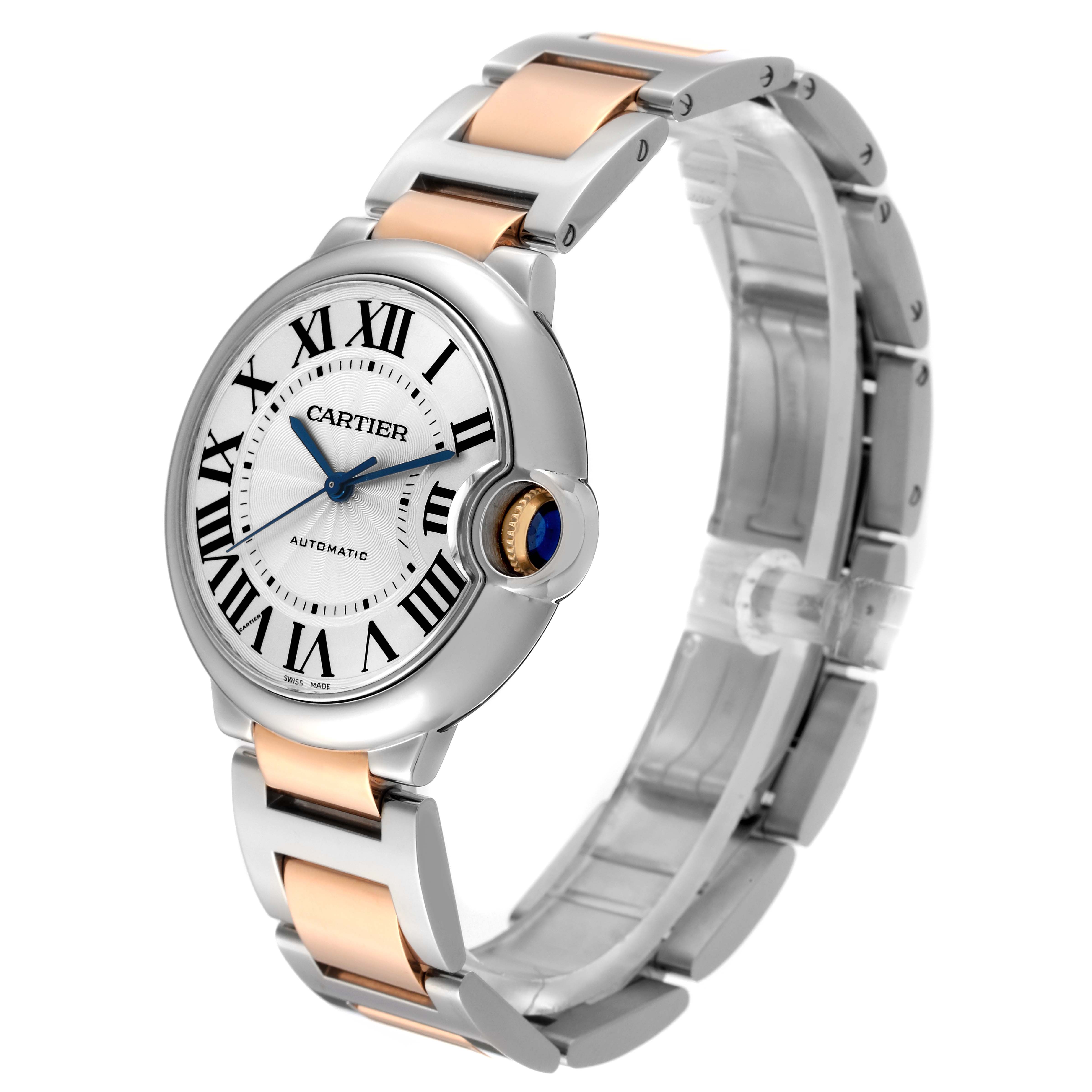 The Cartier Ballon Bleu Women's Steel and Gold (two tone) Silver Dial Women's Steel and Gold (two tone) Silver Dial watch is shown at a three-quarter angle, displaying its face, bracelet, and crown.