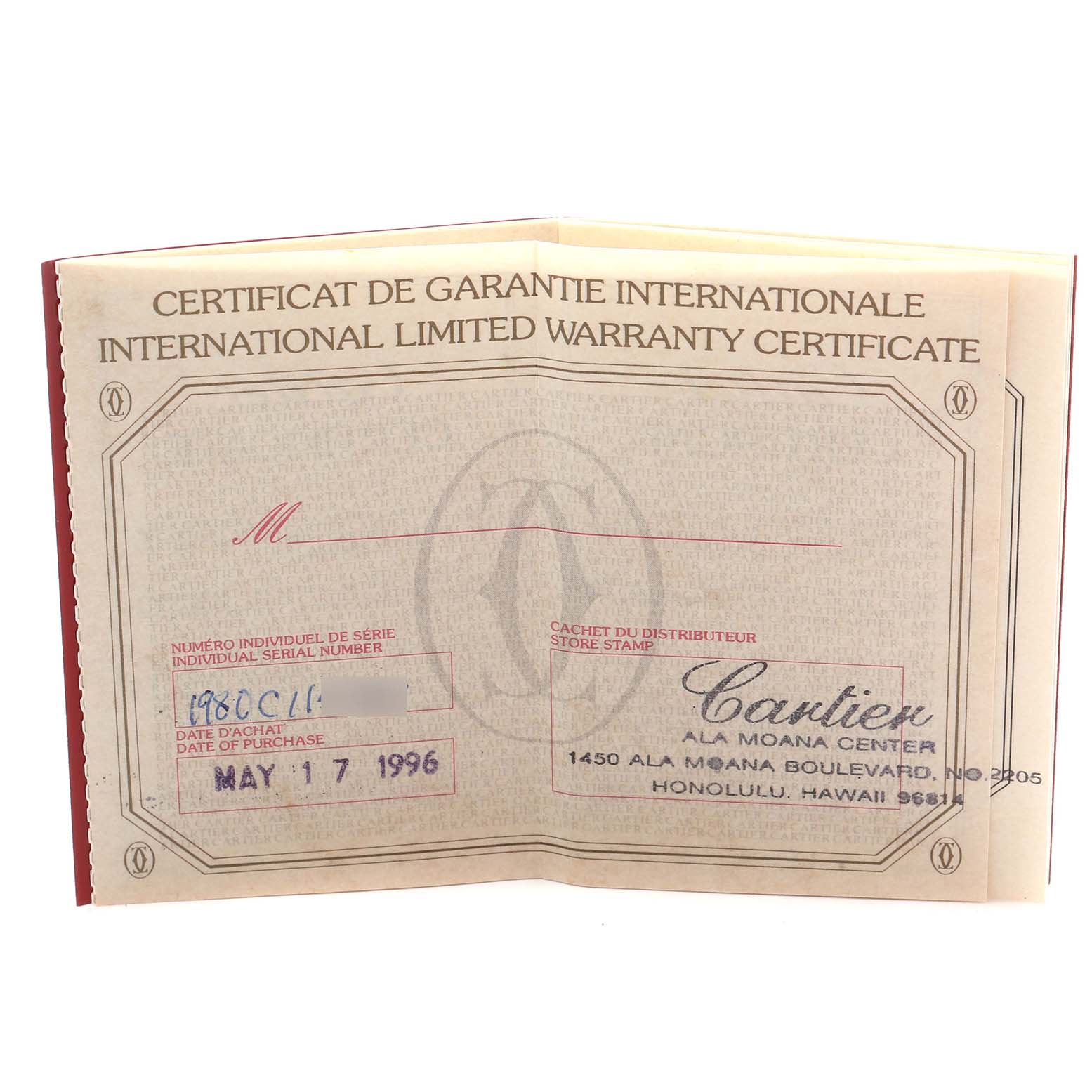 The image shows an open warranty certificate for the Cartier Colisee WB1018A8 Women
s Yellow Gold Silver Dial watch, including the purchase date and store stamp.