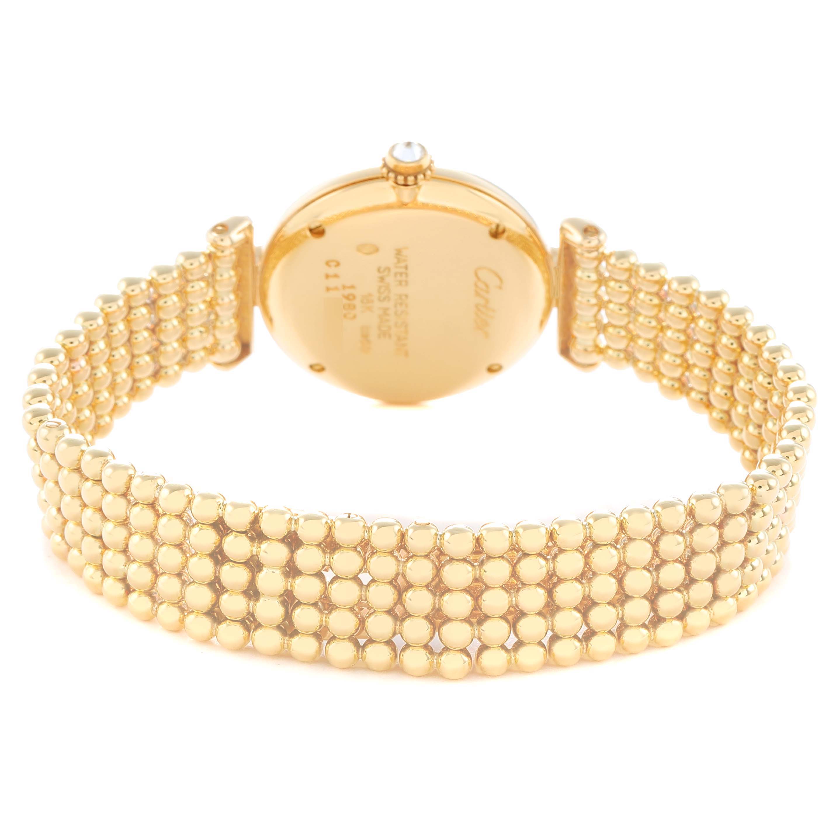 The image shows the back of the Cartier Colisee WB1018A8 Women
s Yellow Gold Silver Dial watch, highlighting the gold bracelet and case back engravings.