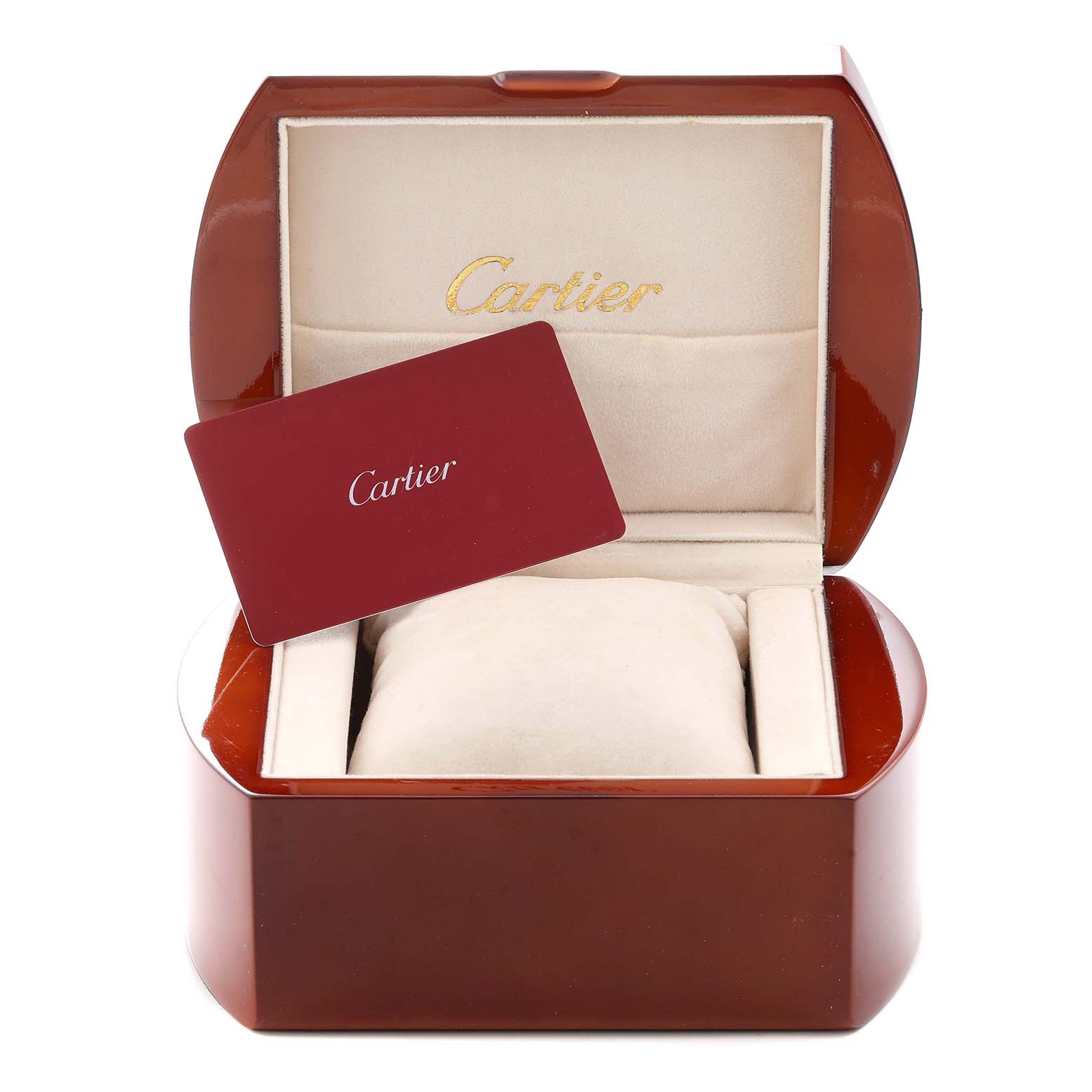 The image shows an open Cartier box for the Calibre de Cartier model with a cushion and card inside.