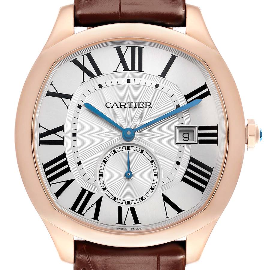 The Calibre de Cartier watch is shown from a front angle, highlighting the dial, Roman numerals, date window, and brown leather strap.