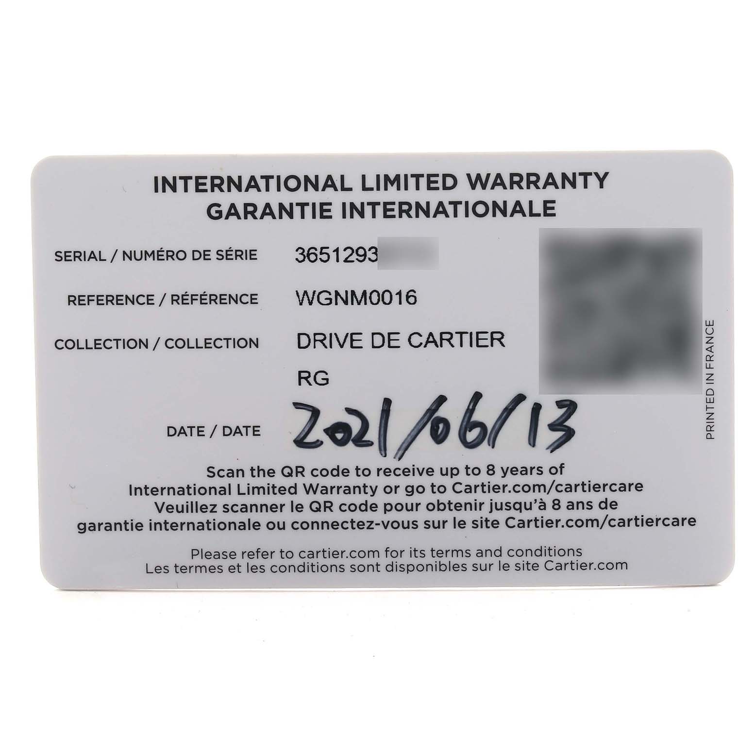 The image shows an international warranty card for a Drive de Cartier watch by Cartier, not the Calibre de Cartier model.