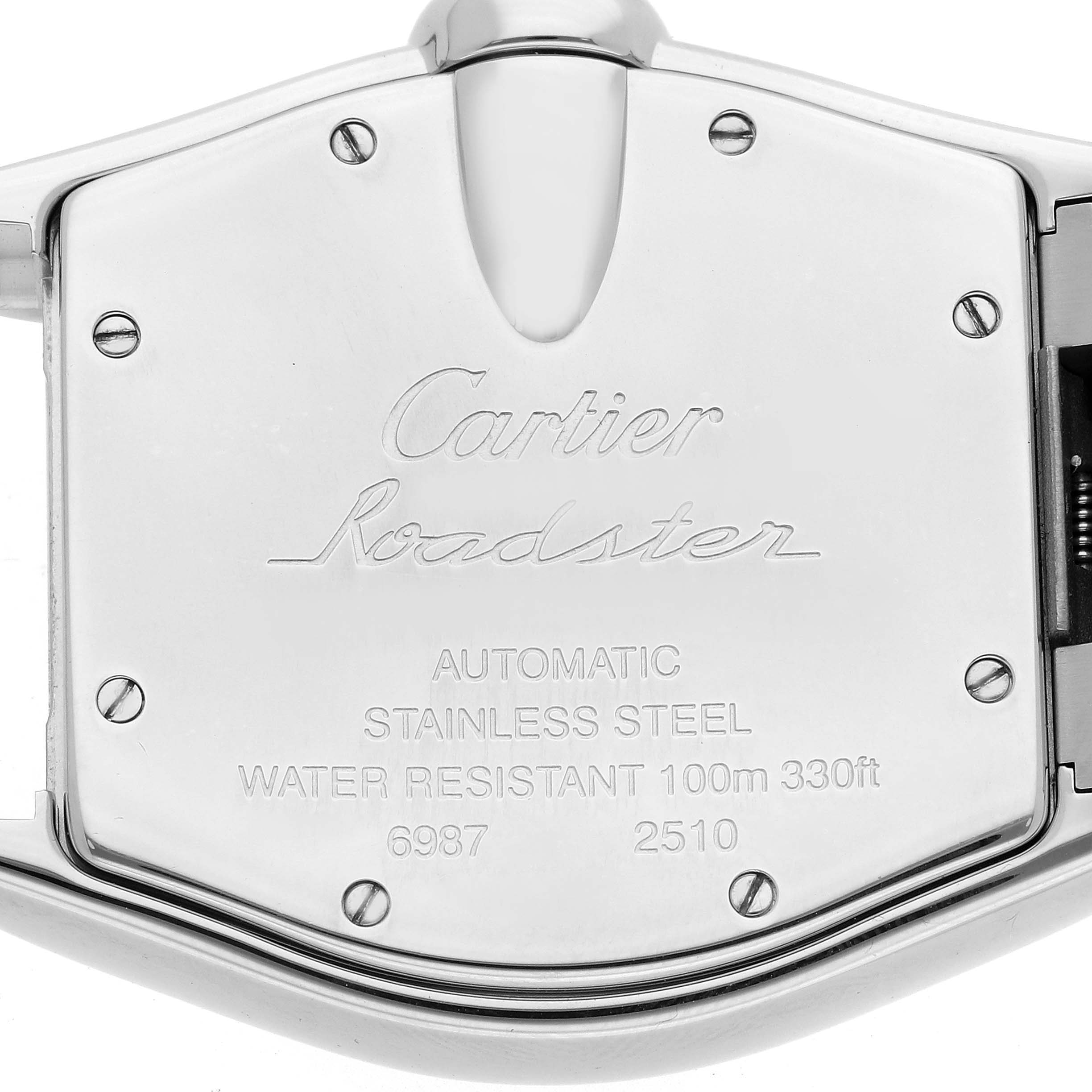 The image shows the back casing of a Cartier Roadster W62004V3 Men
s Stainless Steel Black Dial watch, featuring engravings with specifications and branding.