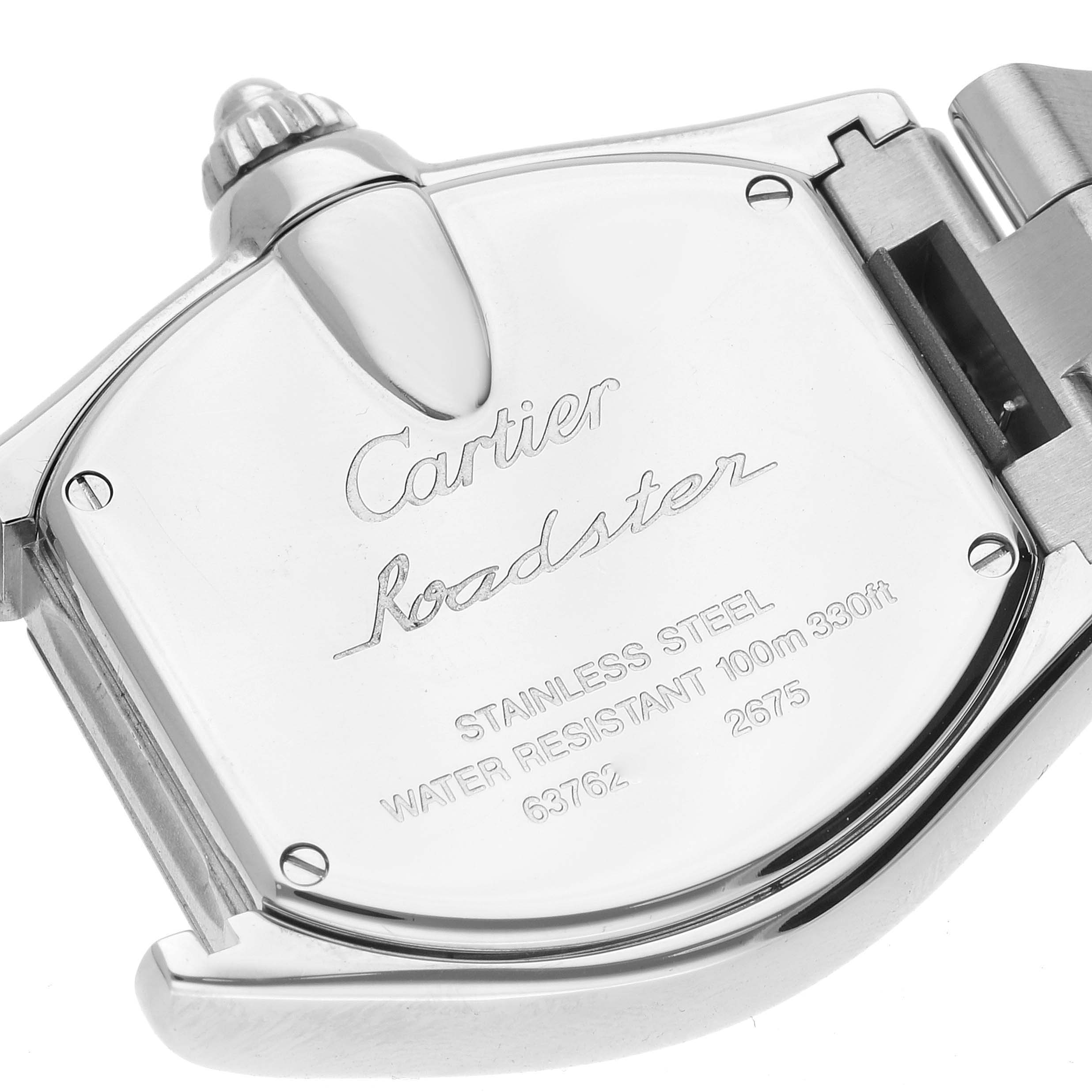 The image shows the back case and part of the band of a Cartier Roadster W62043V3 Women's Stainless Steel Pink Dial W62043V3 Women's Stainless Steel Pink Dial watch, highlighting its inscriptions and detailing.