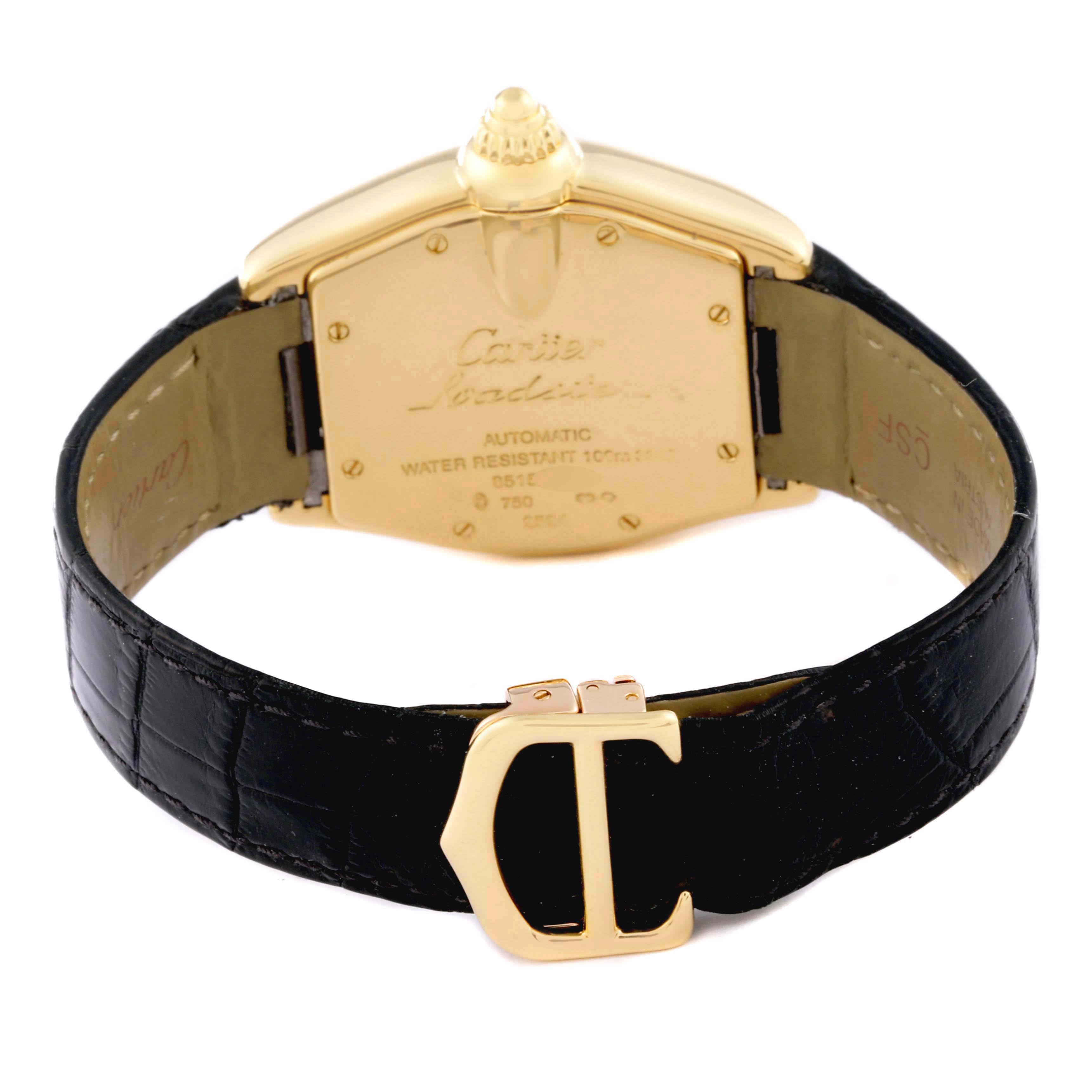 The image shows the back of a Cartier Roadster W62005V2 Men's Yellow Gold Silver Dial W62005V2 Men's Yellow Gold Silver Dial watch with a visible clasp and leather strap.