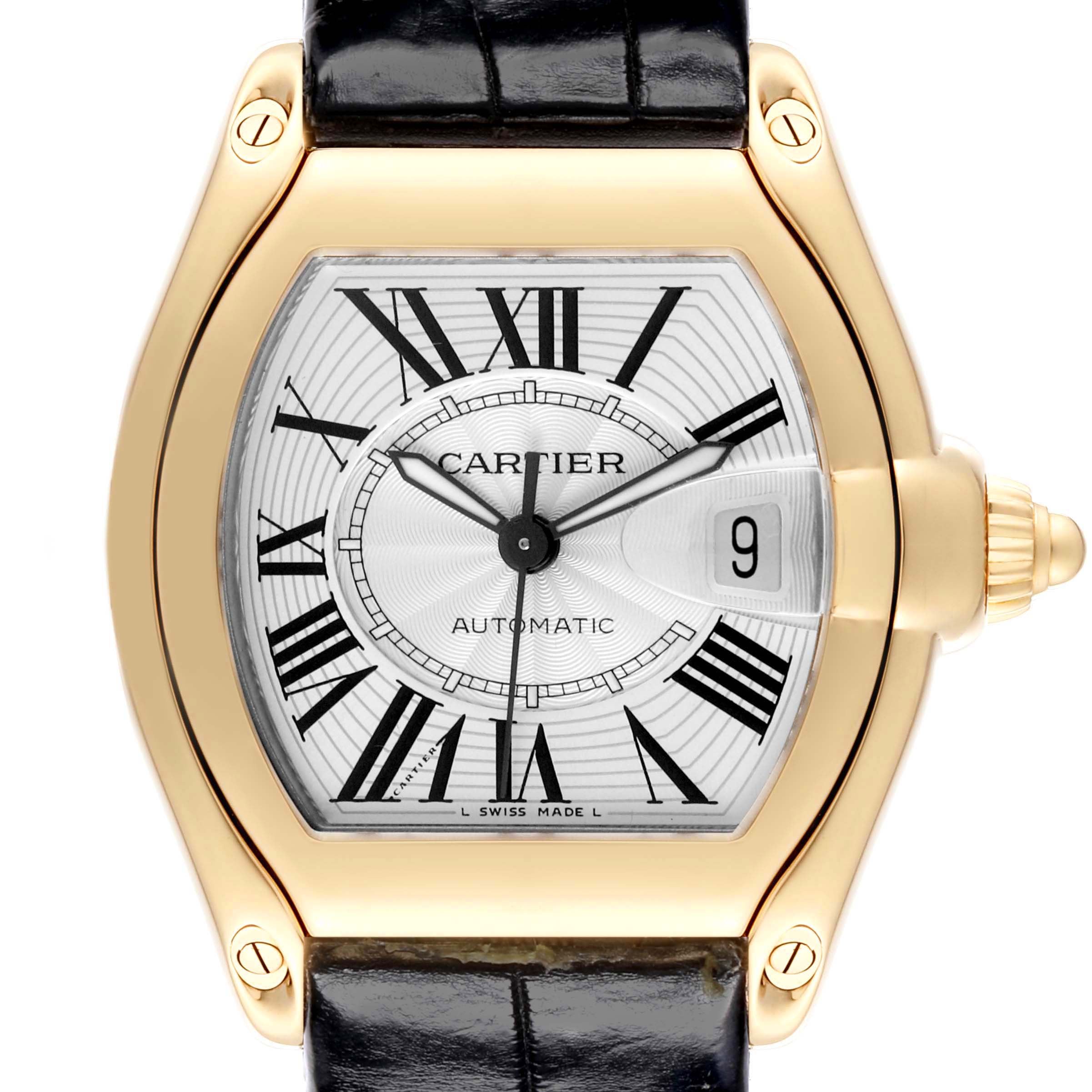 The Cartier Roadster W62005V2 Men's Yellow Gold Silver Dial W62005V2 Men's Yellow Gold Silver Dial watch is shown from a front-facing angle, highlighting the dial, case, crown, and part of the black strap.