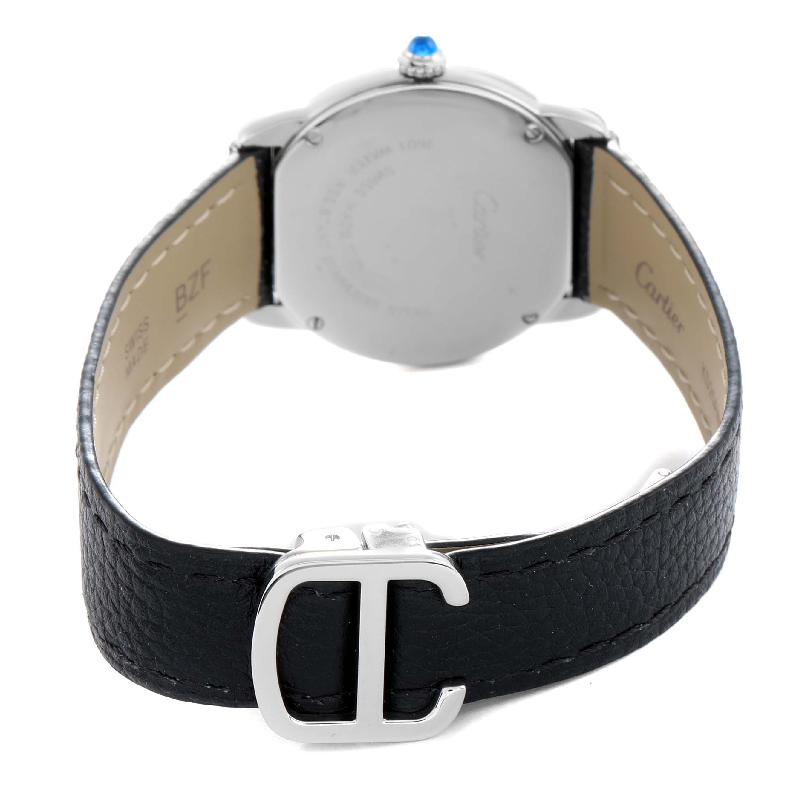 The image shows the back of the Cartier Ronde W6700155 Women
s Stainless Steel Silver Dial watch, highlighting the case back, leather strap, and a distinctive "C" clasp.