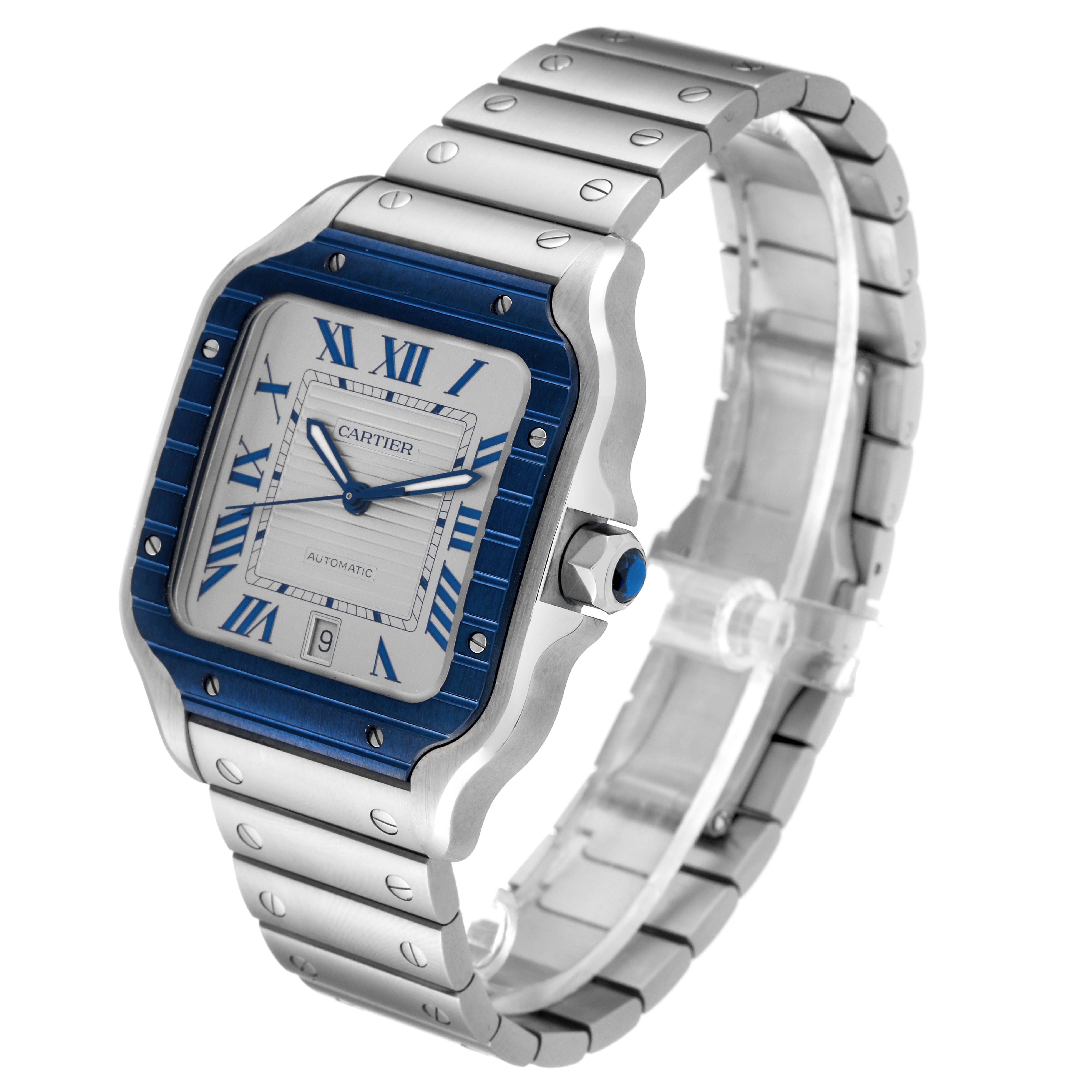 The image shows a Cartier Santos WSSA0048 Men
s Stainless Steel Silver Dial WSSA0048 Men
s Stainless Steel Silver Dial model watch from an angled perspective, highlighting the face, bezel, and stainless steel bracelet.