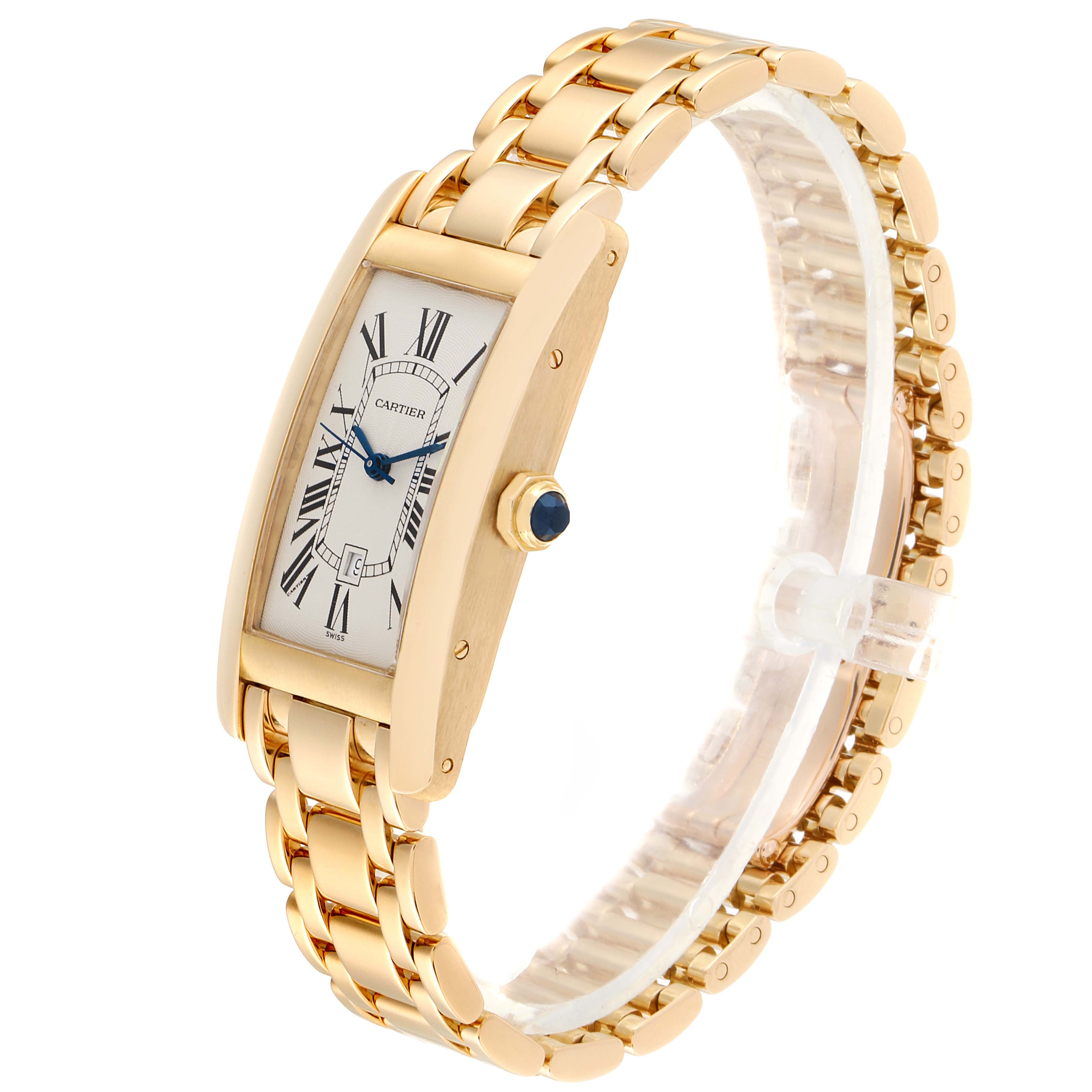 The Cartier Tank Americaine W26035K2 Women's Yellow Gold Silver Dial W26035K2 Women's Yellow Gold Silver Dial watch is shown at a three-quarter angle, displaying its gold casing, bracelet, and dial with Roman numerals.