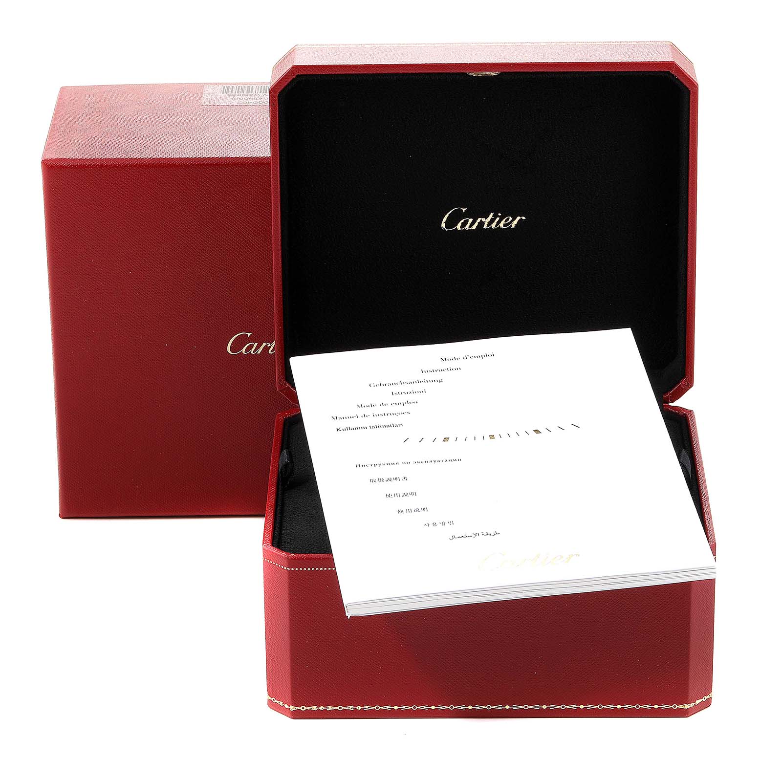 This image shows the box and instruction manual for the Cartier Tank Americaine W26035K2 Women's Yellow Gold Silver Dial W26035K2 Women's Yellow Gold Silver Dial model watch.