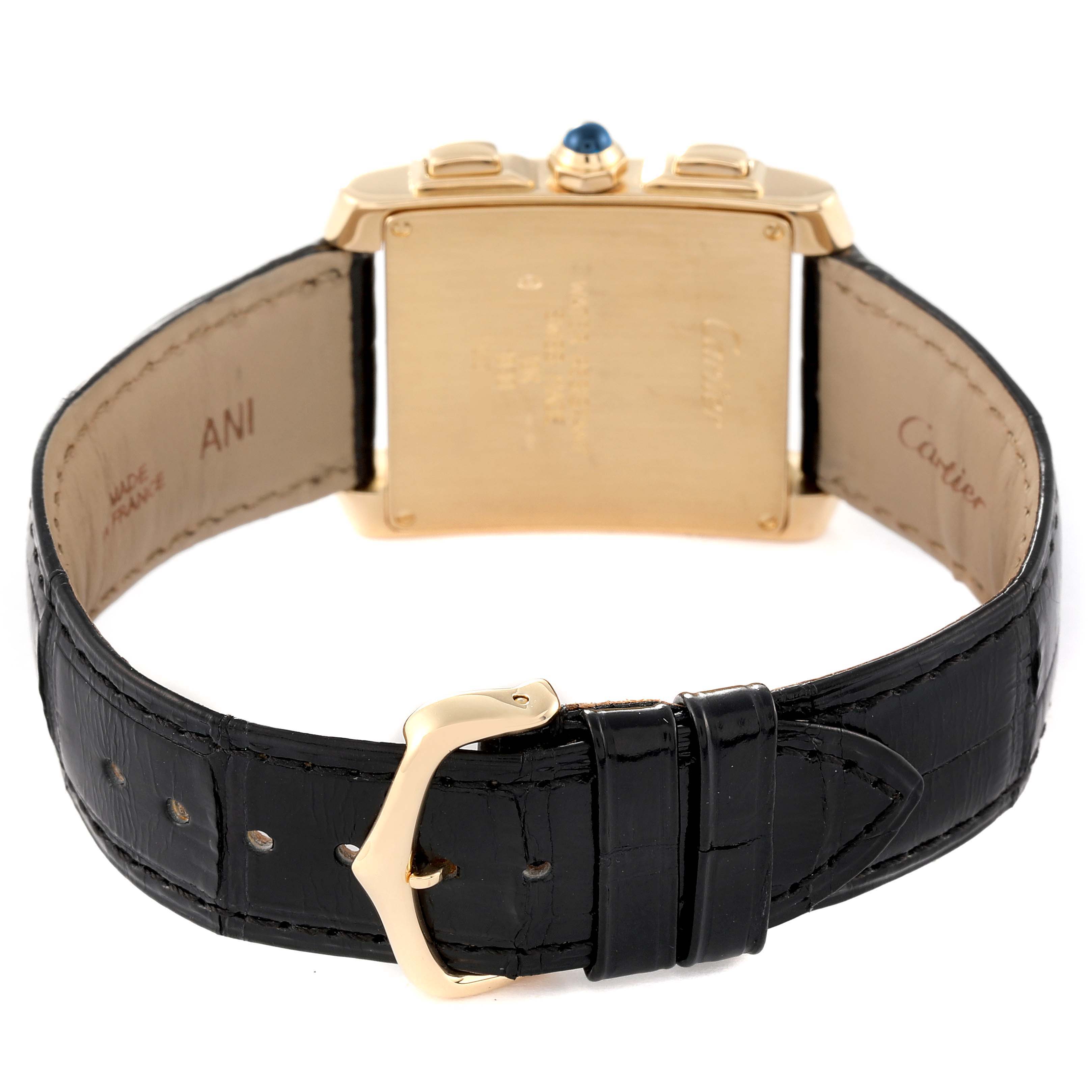 The image shows the back view of a Tank Francaise watch by Cartier, highlighting its leather strap and buckle.