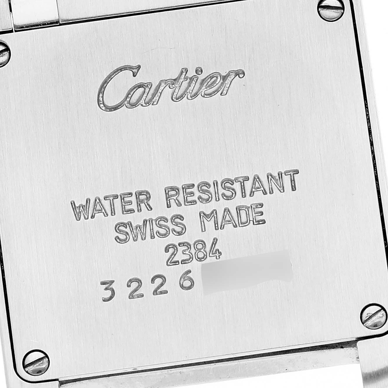 The image shows the back case of a Cartier Tank Française watch, highlighting its water resistance and Swiss-made inscription.