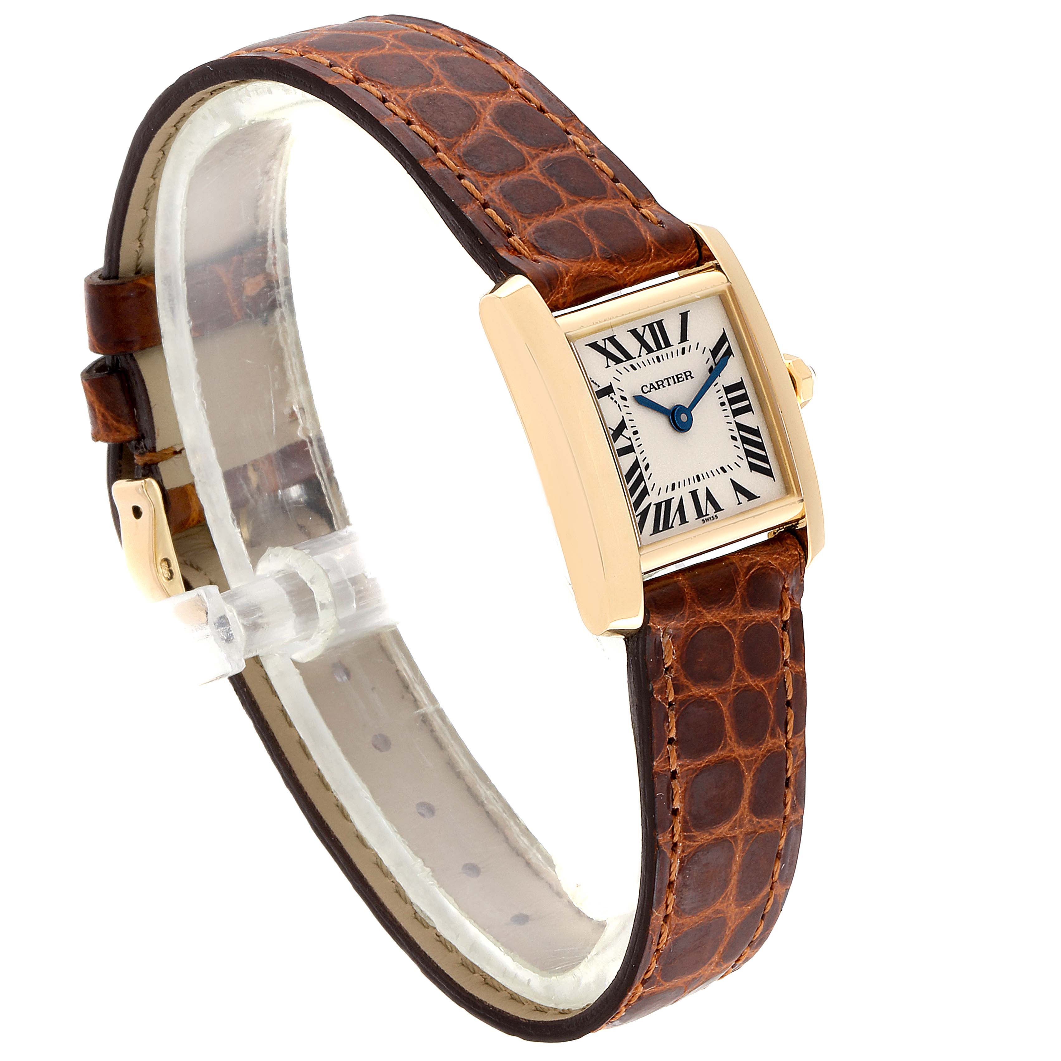 The image shows a side angle of a Cartier Tank Francaise W5000256 Women's Yellow Gold Silver Dial W5000256 Women's Yellow Gold Silver Dial watch with a brown leather strap and a gold casing.