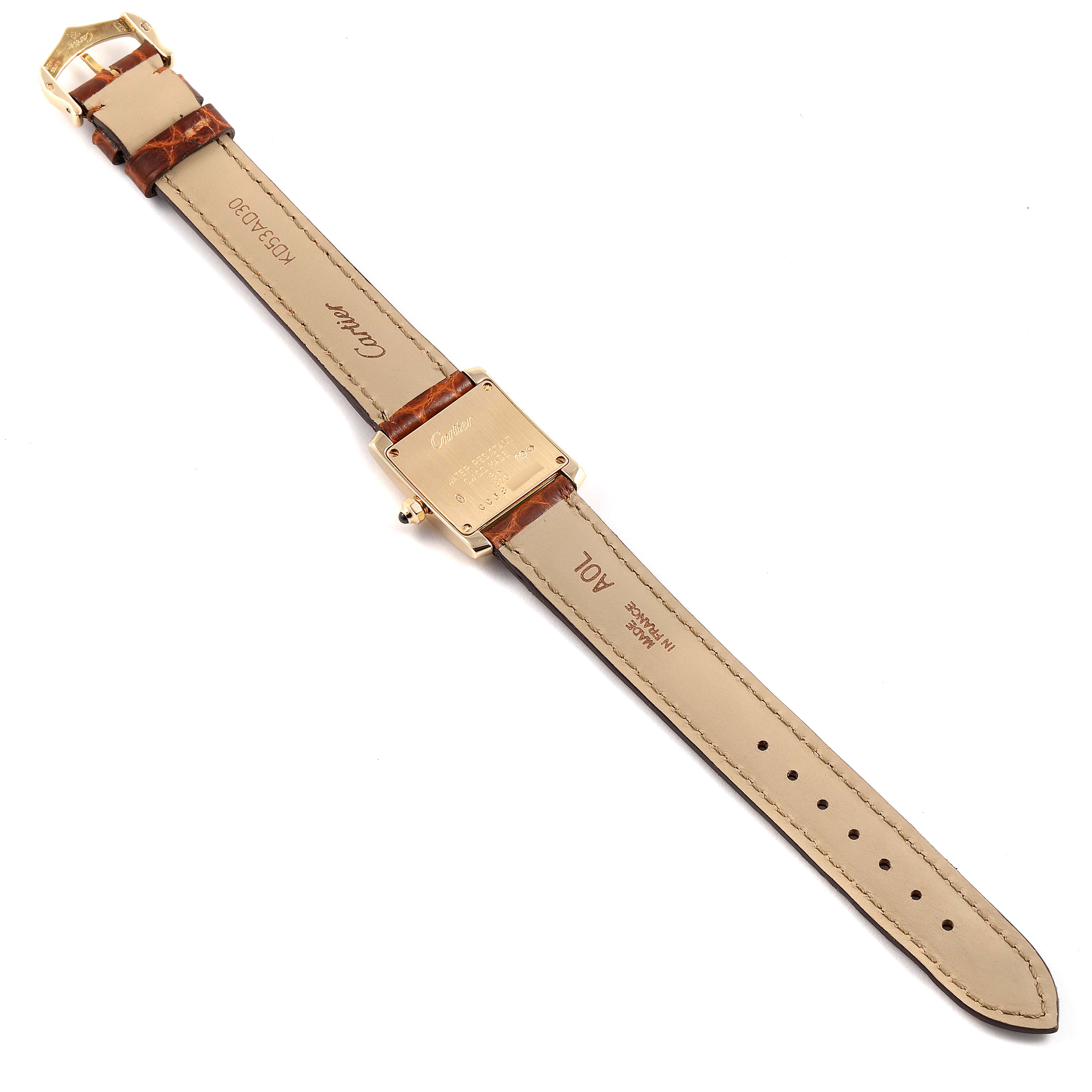 The image shows the back side of the Cartier Tank Francaise W5000256 Women's Yellow Gold Silver Dial W5000256 Women's Yellow Gold Silver Dial watch, including the case back and leather straps.