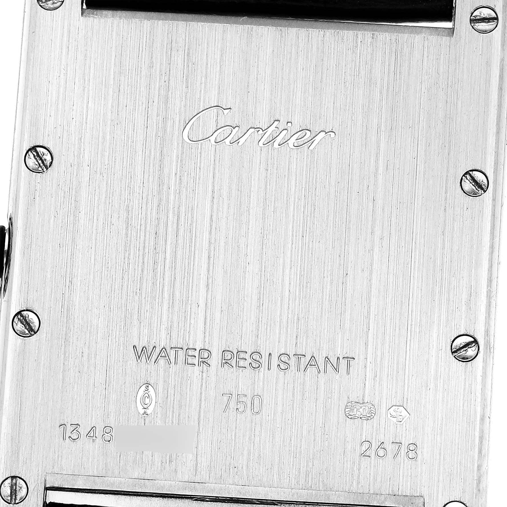 The image shows the back casing of a Cartier Tank Louis W1540956 Men's White Gold Silver Dial W1540956 Men's White Gold Silver Dial watch, highlighting engravings and screws.