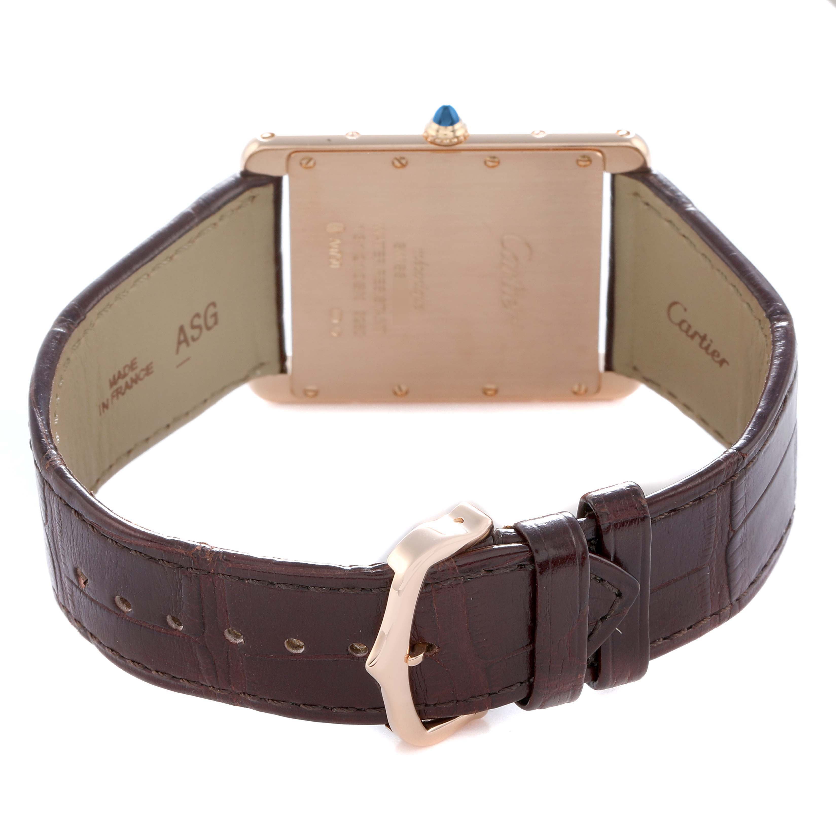 The image shows the back view of a Cartier Tank Louis W1560017 Men
s Rose Gold Silver Dial watch, highlighting the case, strap, and buckle.
