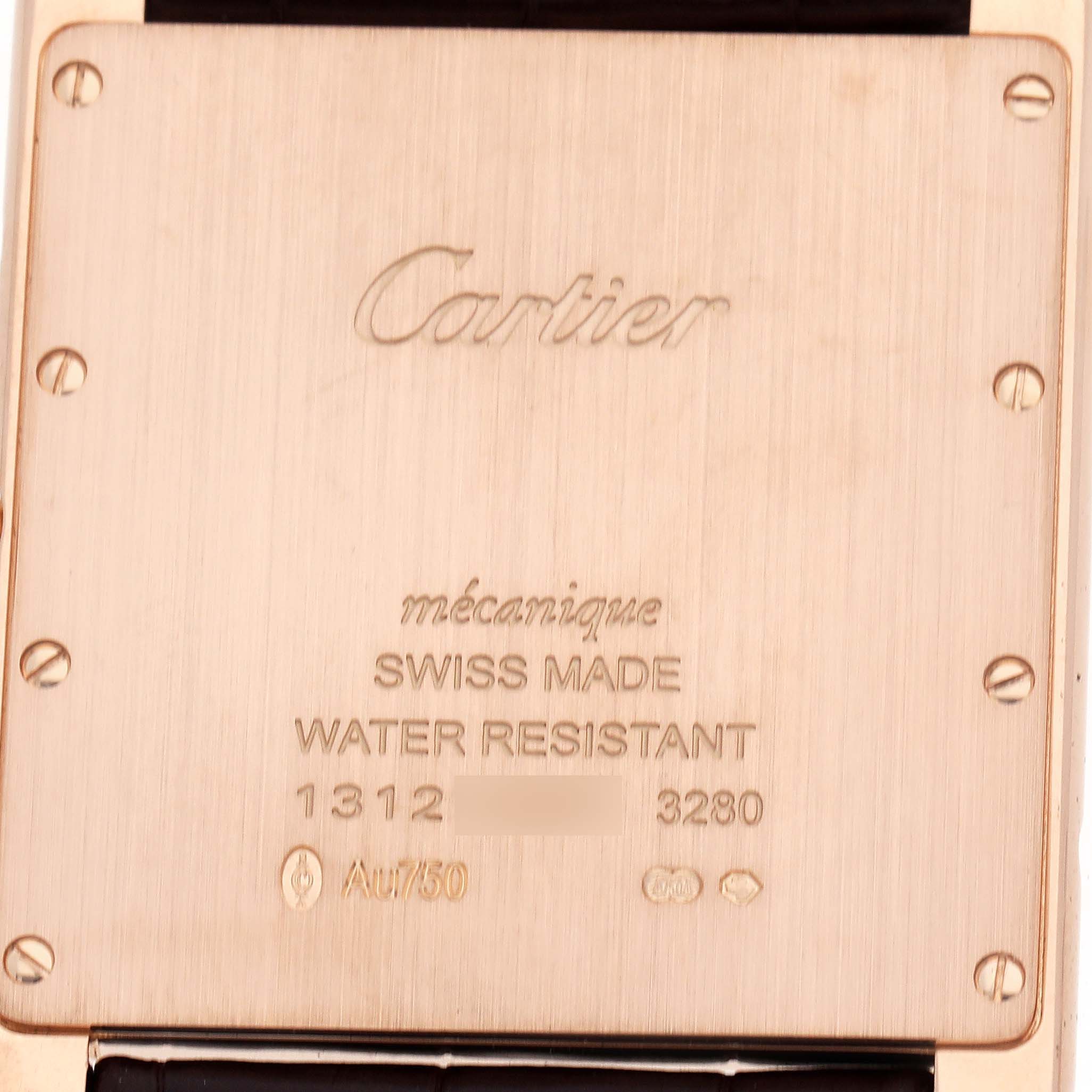 The image shows the back case of a Cartier Tank Louis W1560017 Men
s Rose Gold Silver Dial watch, displaying engravings and screws.