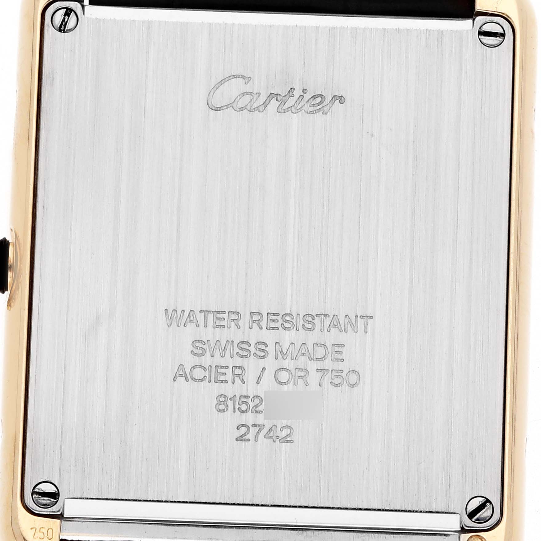 The image shows the back case of a Cartier Tank Solo W1018855 Men
s Steel and Gold (two tone) Silver Dial watch, highlighting its engravings.