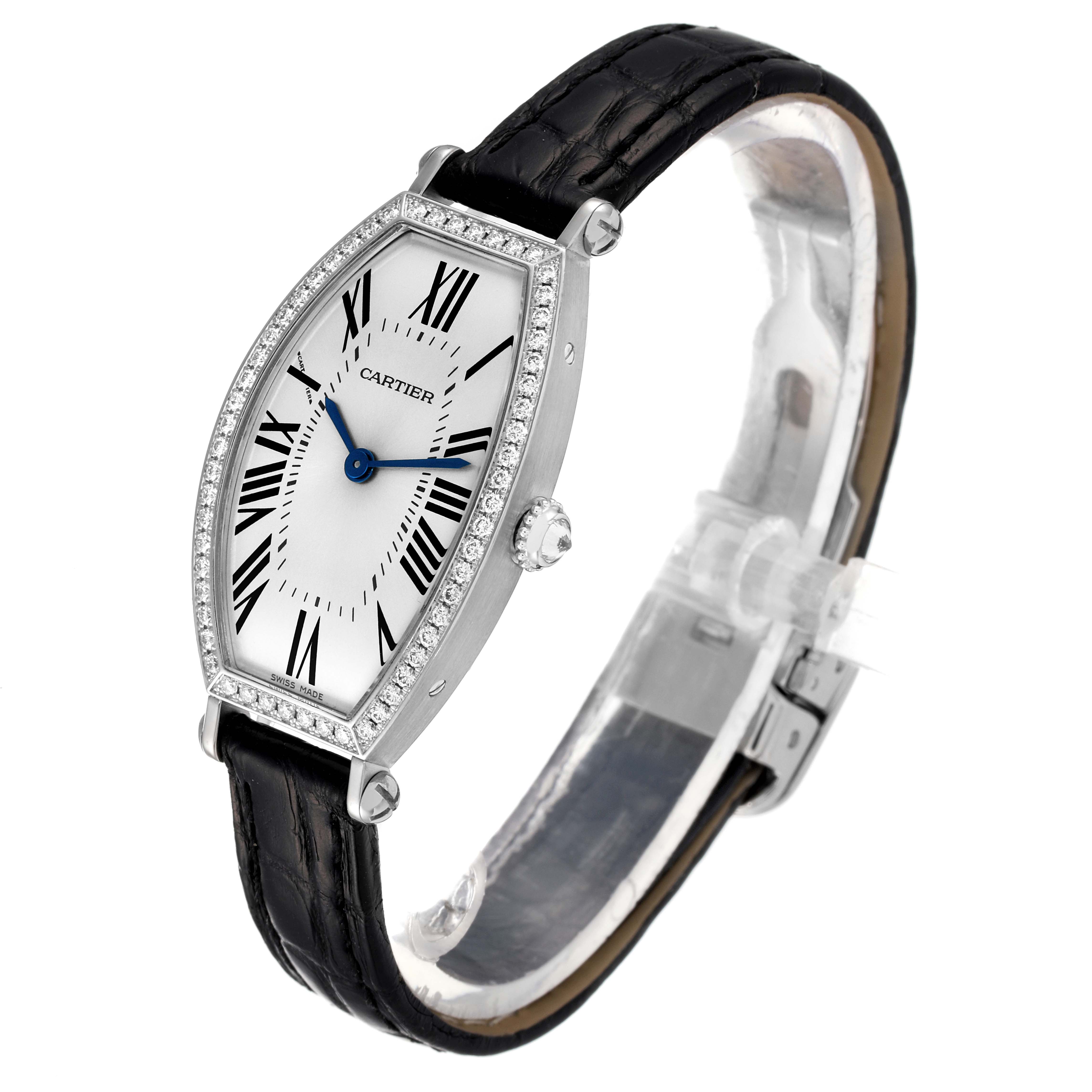 The Cartier Tortue WE400131 Women
s White Gold Silver Dial WE400131 Women
s White Gold Silver Dial watch is shown at a slight angle, highlighting the face, leather strap, and diamond bezel.