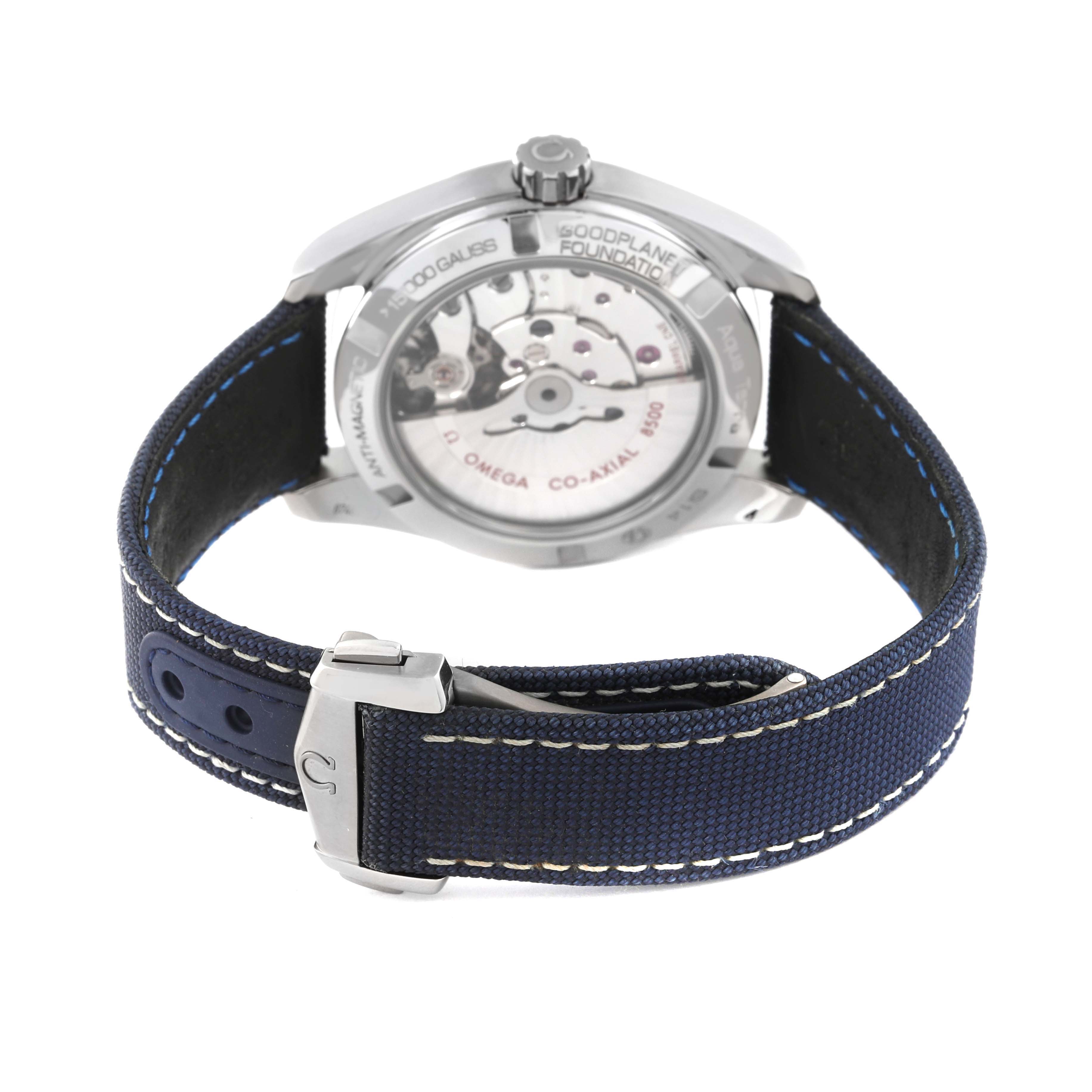 The image shows the Omega Aqua Terra 231.92.39.21.04.001 Men's Titanium White Dial 231.92.39.21.04.001 Men's Titanium White Dial watch from the back angle, highlighting the see-through case back and blue strap.